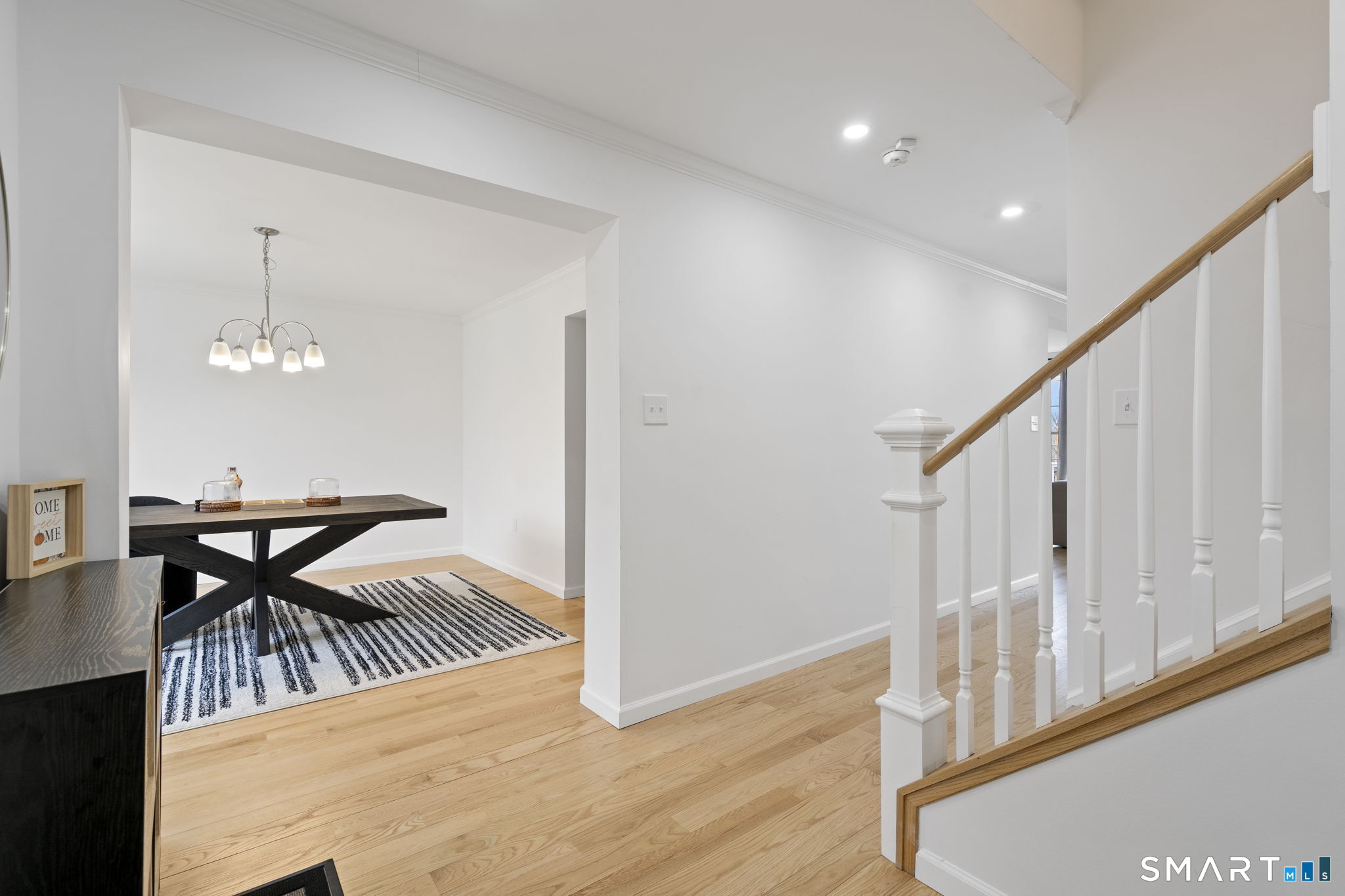156 Dayton Road Bridgeport, CT 06606 - Photo 22 of 28 a view of a room with furniture and wooden floor