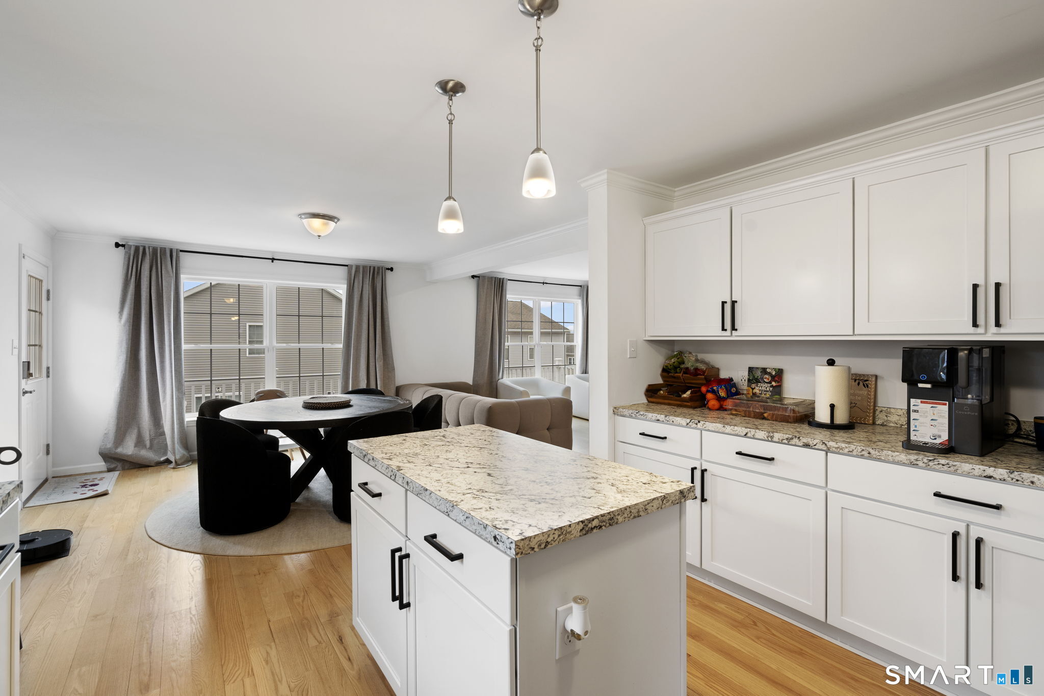 156 Dayton Road Bridgeport, CT 06606 - Photo 25 of 28 a kitchen with a stove sink and cabinets
