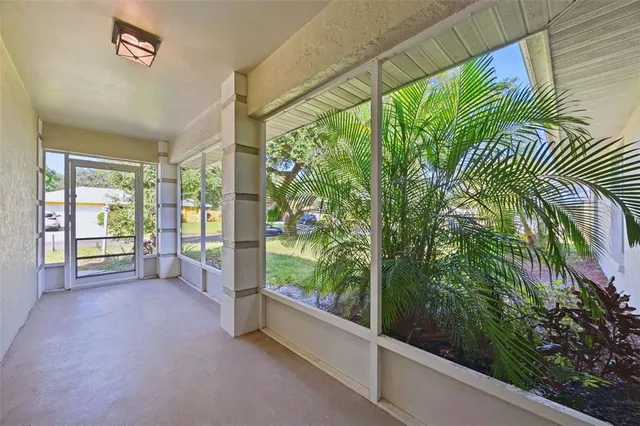 a view of a garden with an outdoor space