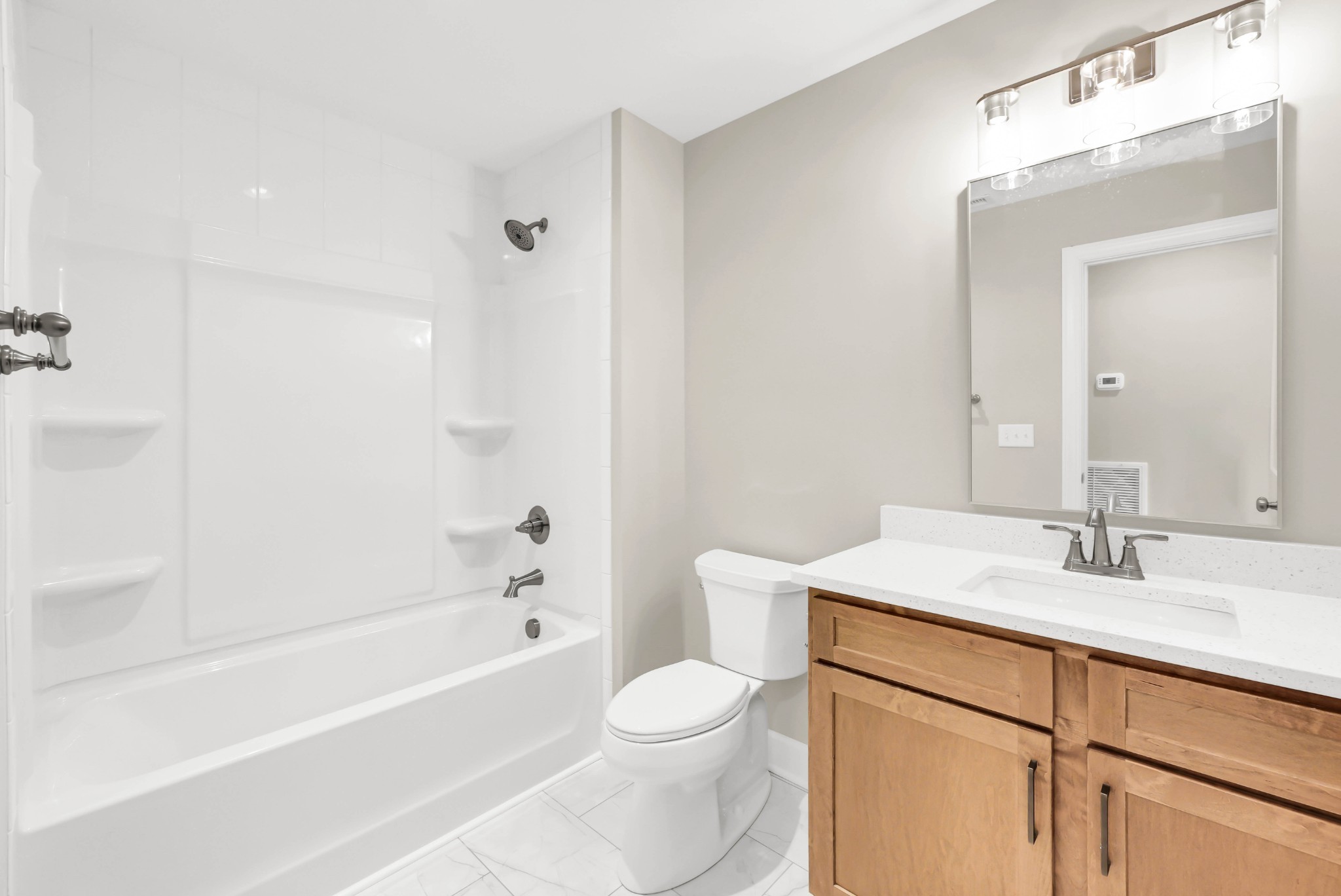 262 Rossview Road Clarksville, TN 37043 - Photo 30 of 43 a bathroom with a sink a toilet and shower