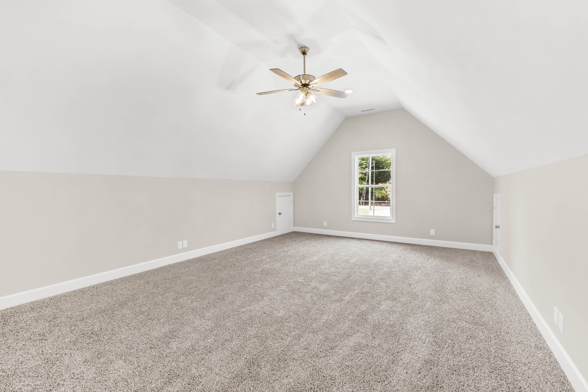 262 Rossview Road Clarksville, TN 37043 - Photo 31 of 43 an empty room with windows and ceiling fan