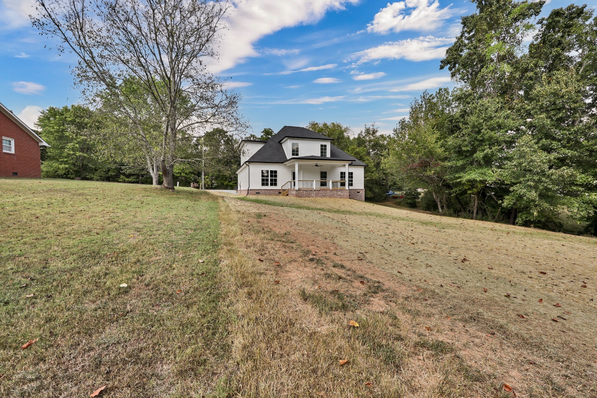 262 Rossview Road Clarksville, TN 37043 - Photo 36 of 43 a view of an house with backyard space and balcony