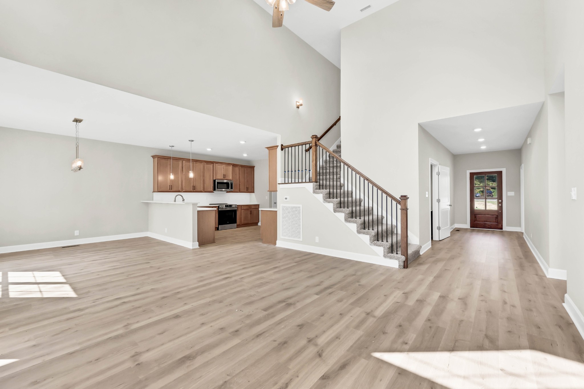 262 Rossview Road Clarksville, TN 37043 - Photo 8 of 43 a view of kitchen living room with wooden floor