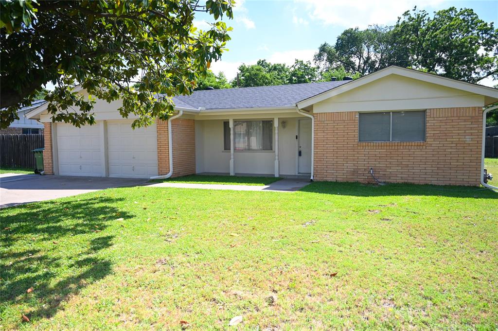 1352 Simpson Drive Hurst, TX 76053 - Photo 4 of 40 Ranch-style residence featuring a brick facade, covered entry, and a two-car attached garage