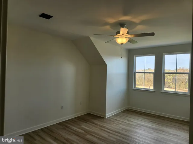 a view of an empty room with window
