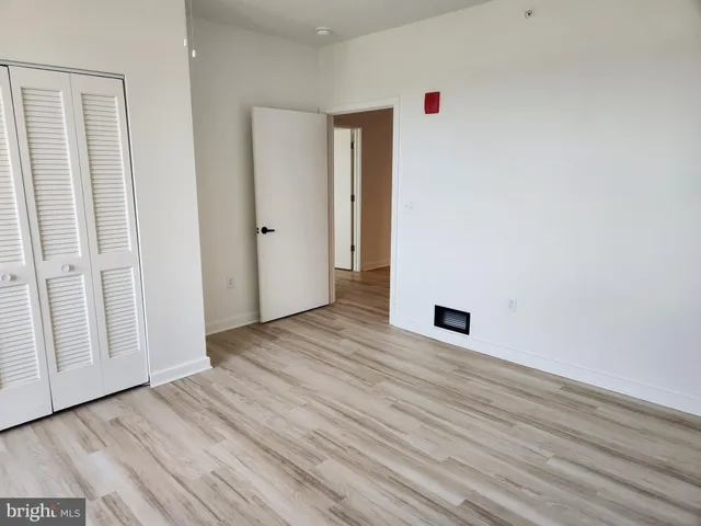 a view of a livingroom with wooden floor