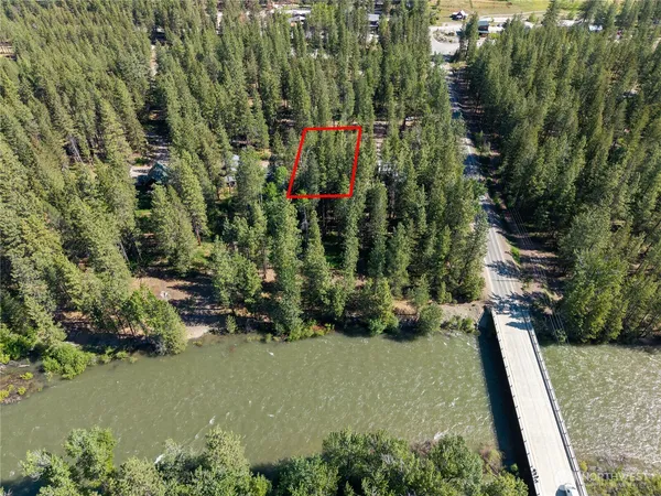 an aerial view of a house having yard