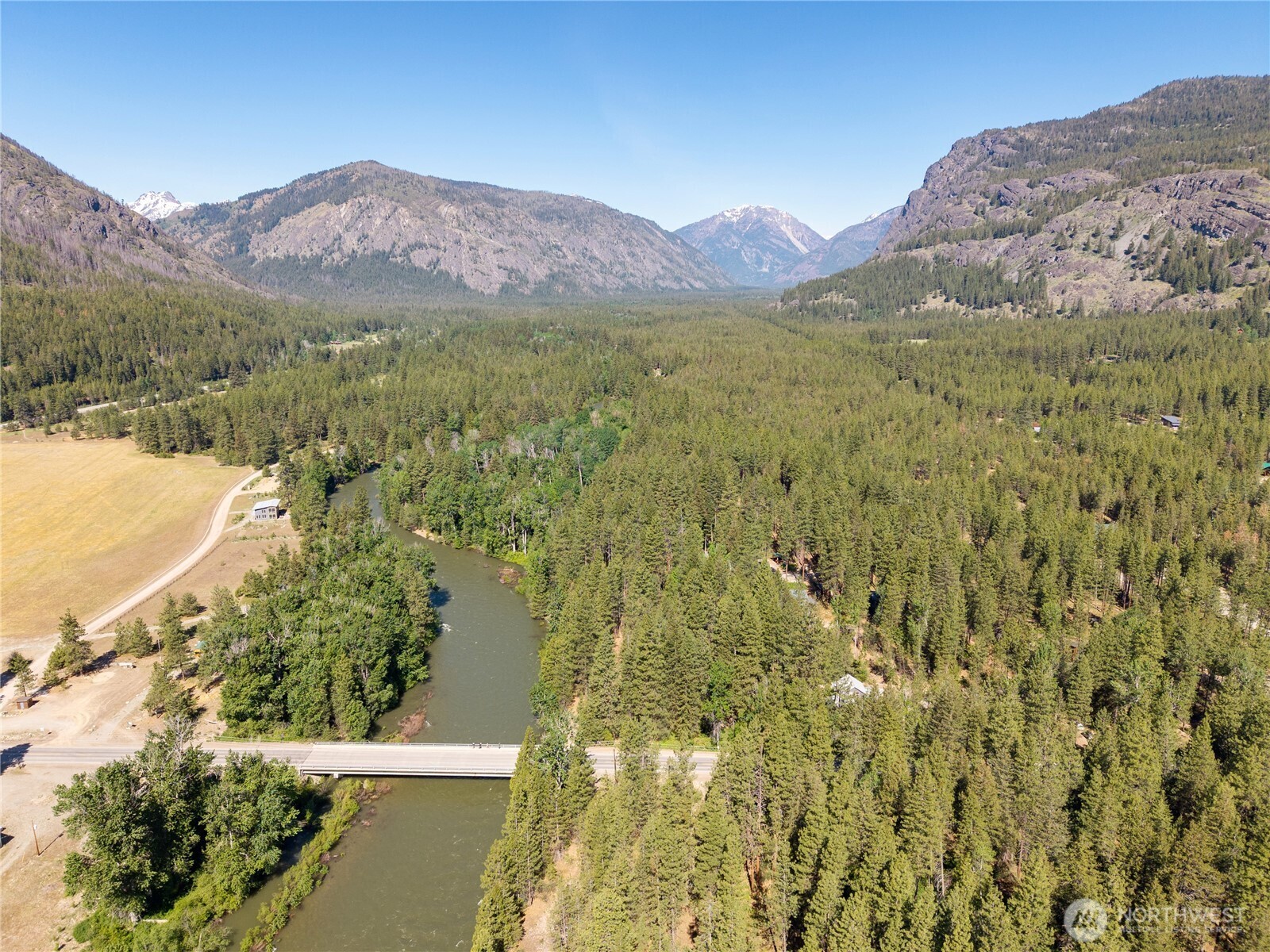 3 Mazama Bridge Road Mazama, WA 98833 - Photo 16 of 29 a view of a city with mountains in the background