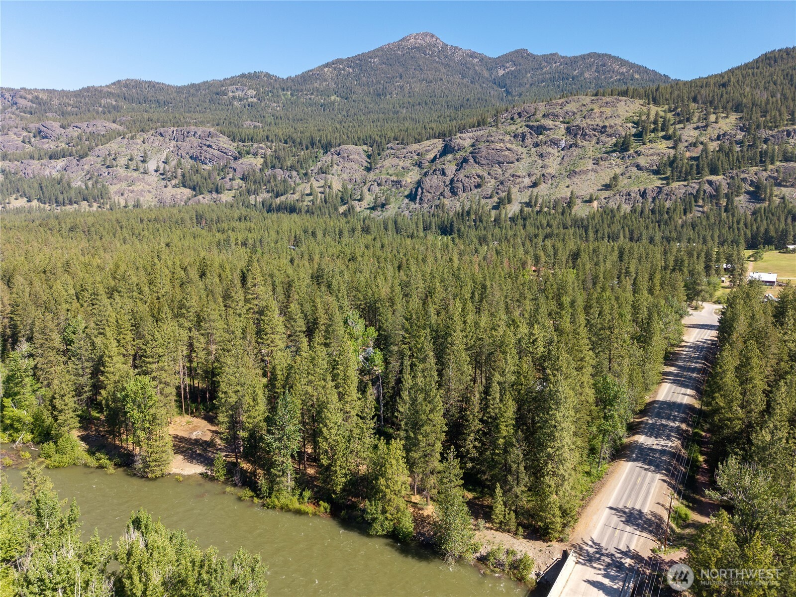 3 Mazama Bridge Road Mazama, WA 98833 - Photo 18 of 29 a view of a town with mountains in the background