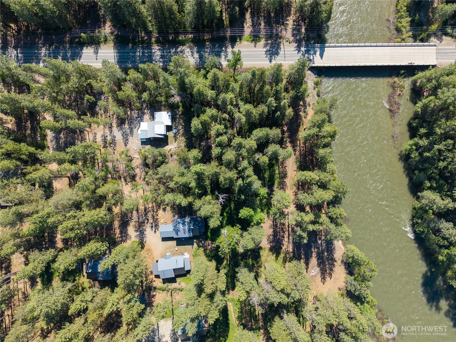 3 Mazama Bridge Road Mazama, WA 98833 - Photo 21 of 29 a view of a lake with a house