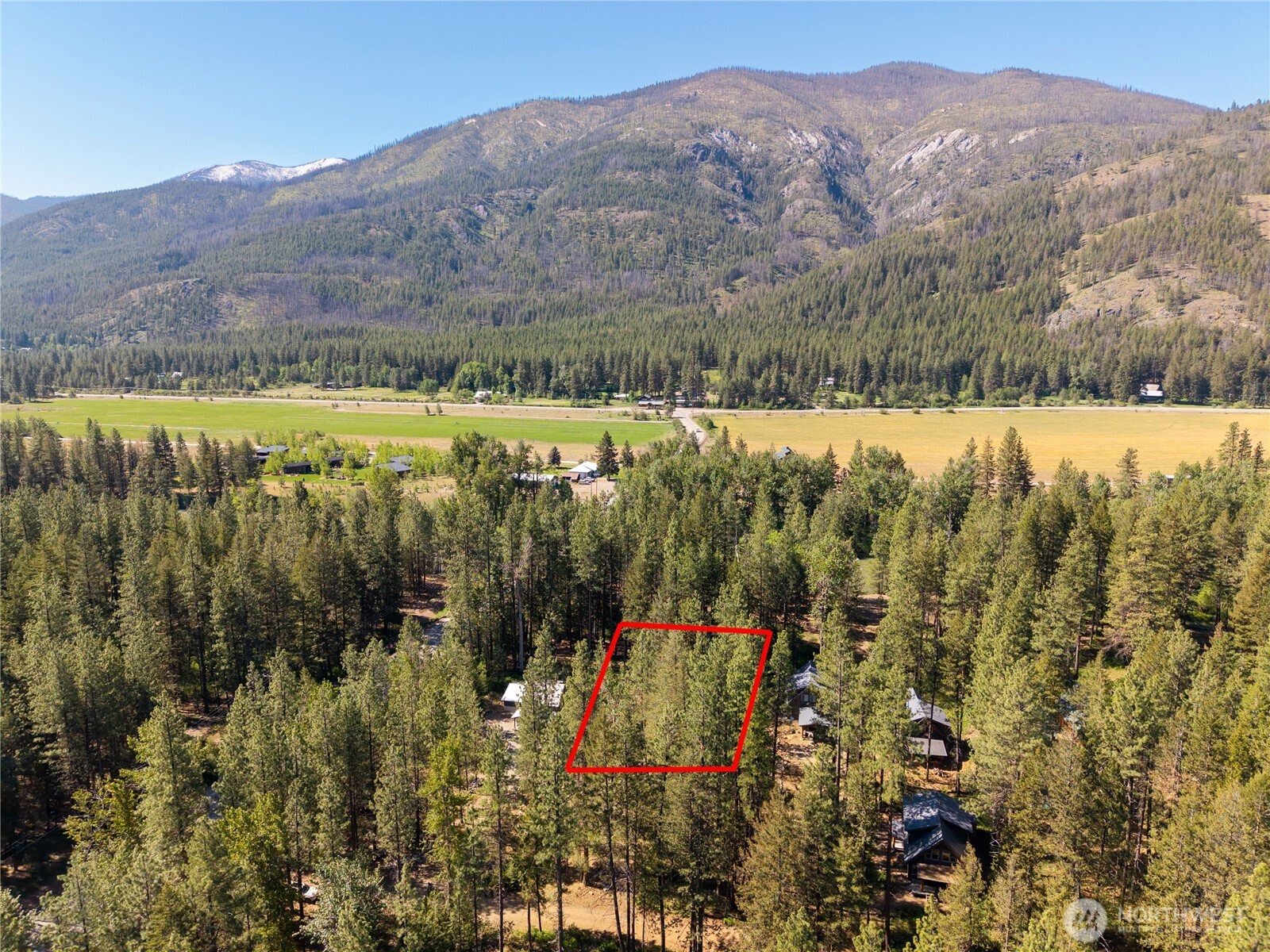 3 Mazama Bridge Road Mazama, WA 98833 - Photo 4 of 29 a view of a city with mountains in the background
