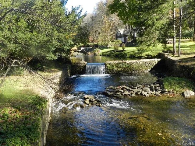 a view of a lake with a house