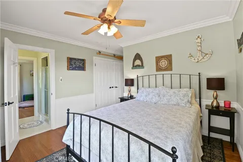 a bedroom with furniture and a window