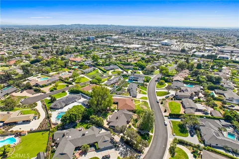 an aerial view of a city with lots of residential buildings