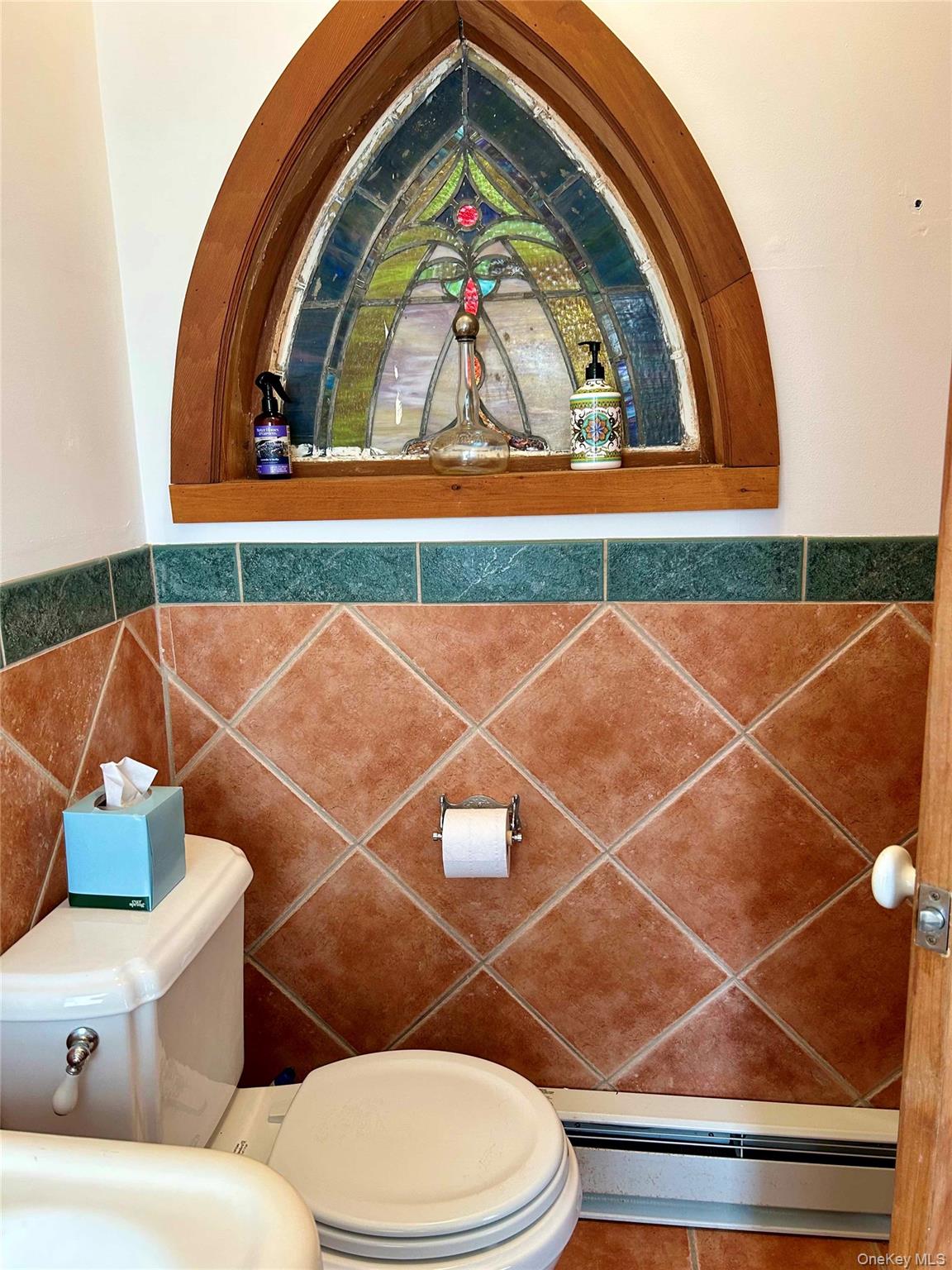 186 Taylor Road Cornwall, NY 10953 - Photo 20 of 26 Bathroom with toilet, tile walls, and a baseboard heating unit