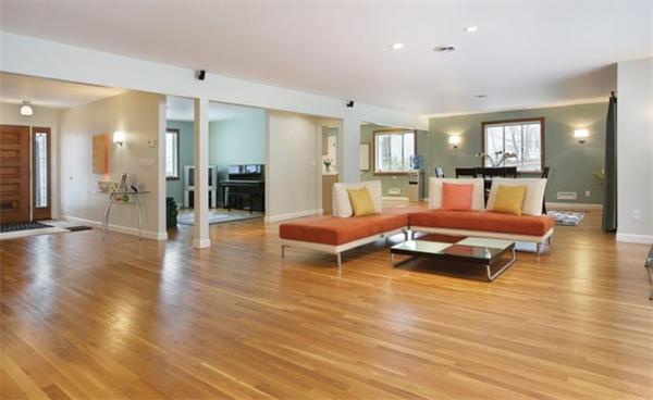124 Arlington Road Brookline, MA 02467 - Photo 3 of 6 a living room with furniture and wooden floor
