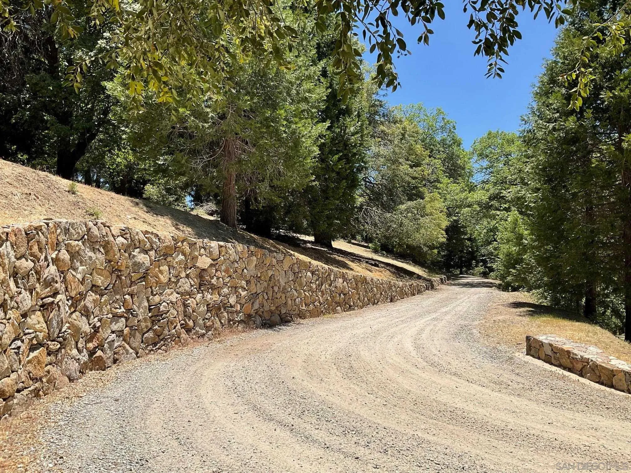 3413 Fern Meadow Road Palomar Mountain, CA 92060 - Photo 34 of 38 a view of a snow on the side of a road