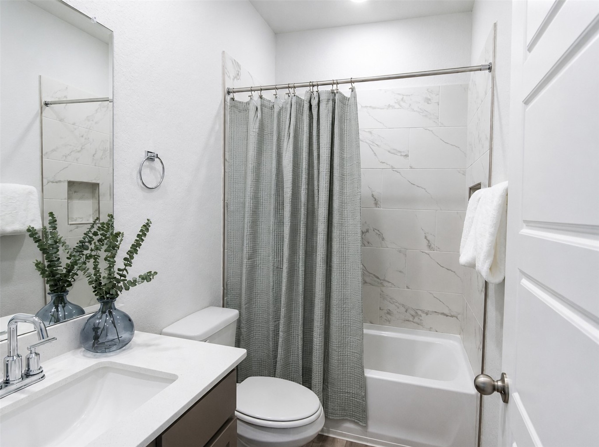 1924 Split Rock Road New Braunfels, TX 78130 - Photo 11 of 20 Gleaming stone counters paired with custom tile surround the relaxing bathtub.
