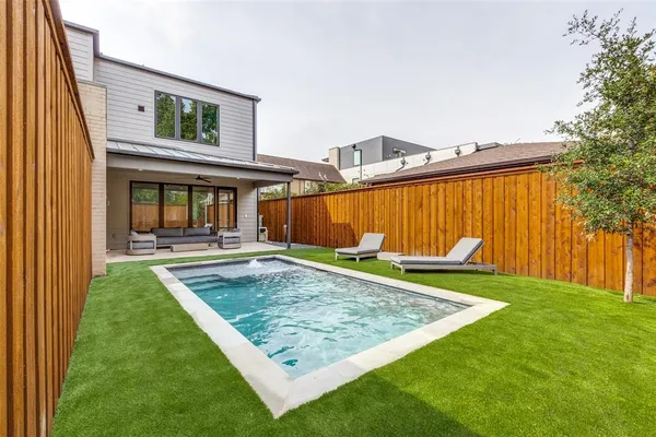 a view of a backyard with a patio