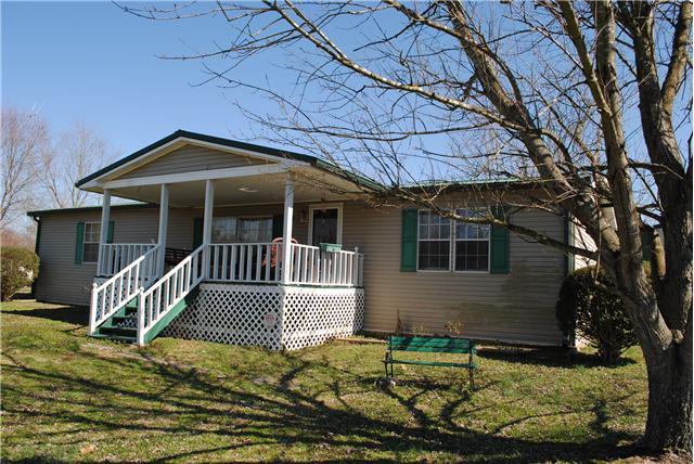 1324 Rock Springs Road Bethpage, TN 37022 - Photo 20 of 20 1324 Rock Springs Road - Beautiful country home & setting. Wonderful, great laying 5 acres, fenced rear, otehr partial fencing, oversized detached garage (covered breezeway to sunroom). 6 person storm shelter. Open floor plan, split BD system, Florid
