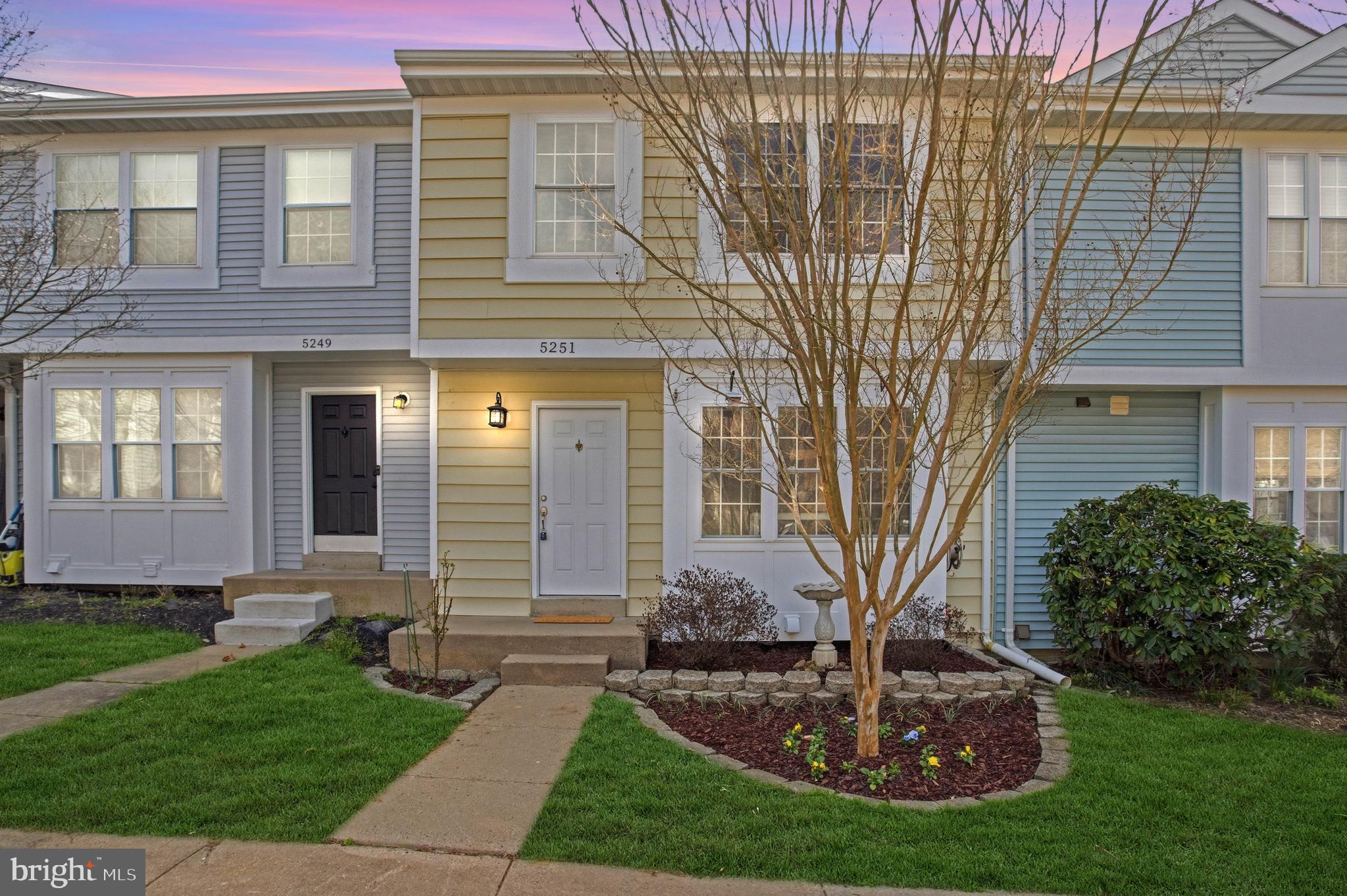 5251 Spring Branch Boulevard Dumfries, VA 22025 - Photo 1 of 25 a front view of a house with garden