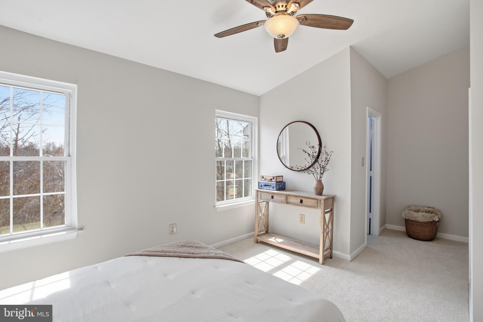 5251 Spring Branch Boulevard Dumfries, VA 22025 - Photo 11 of 25 an empty room with windows and fan