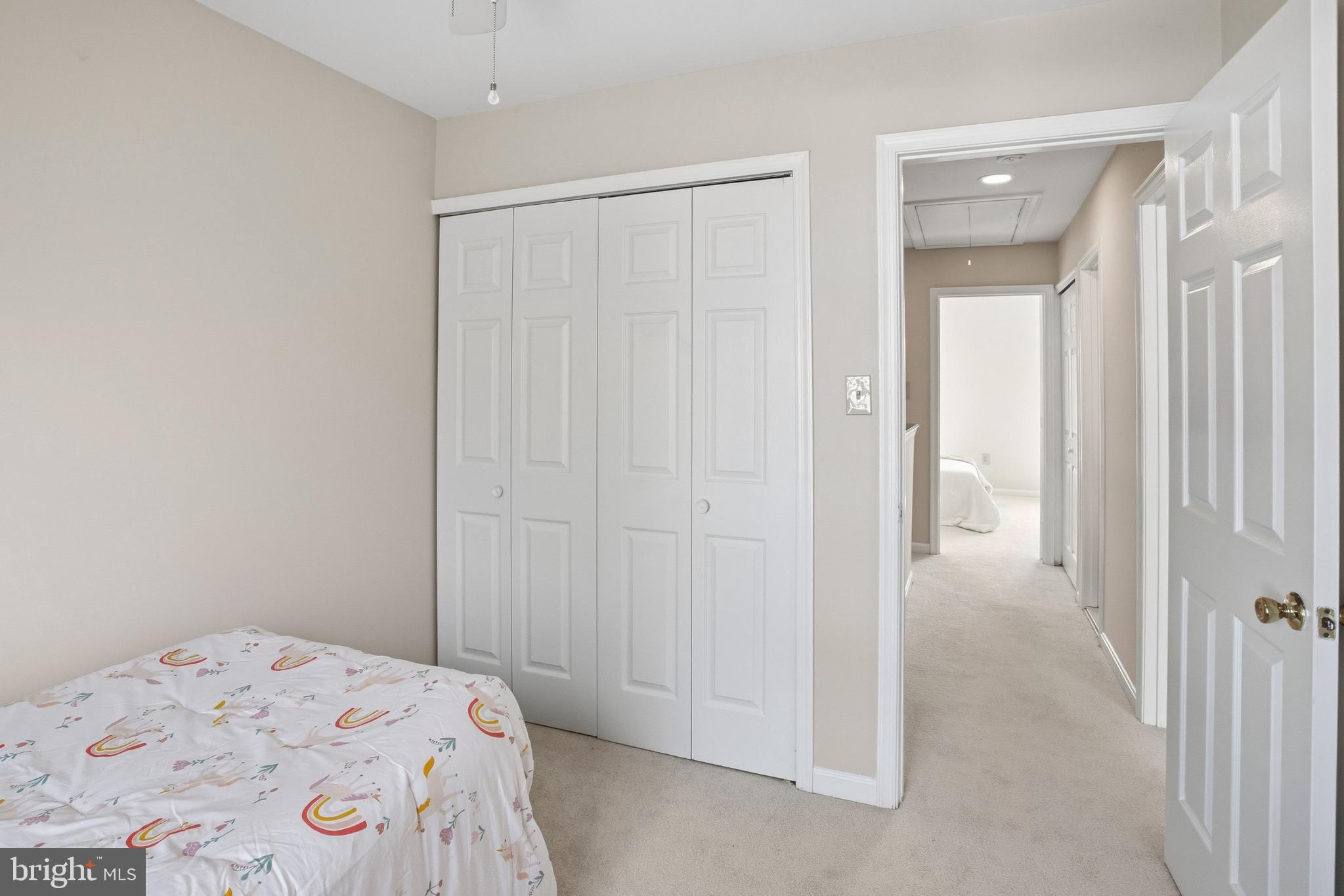 5251 Spring Branch Boulevard Dumfries, VA 22025 - Photo 14 of 25 a bedroom with a bed and a walk in closet