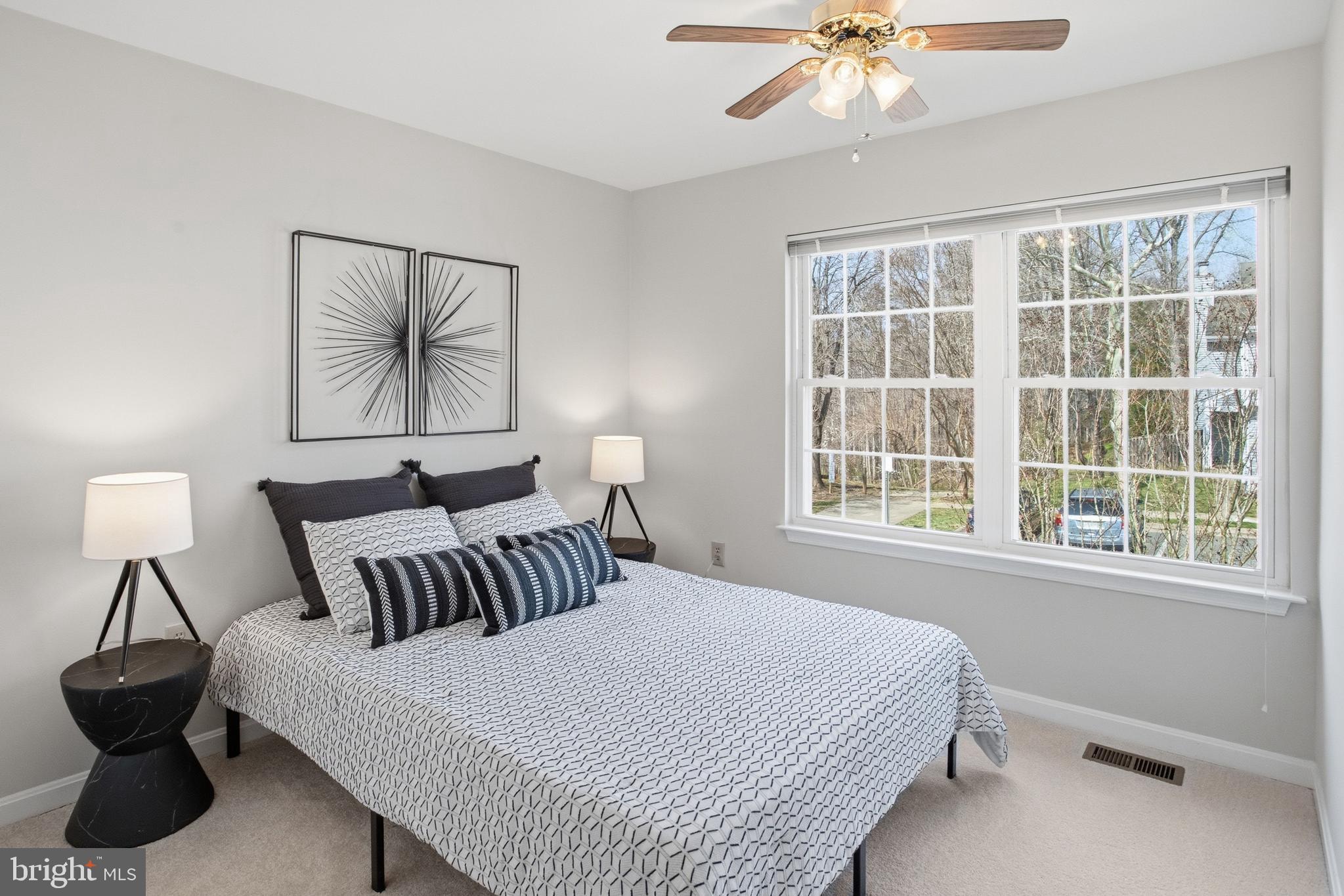 5251 Spring Branch Boulevard Dumfries, VA 22025 - Photo 15 of 25 a bedroom with a bed and a window