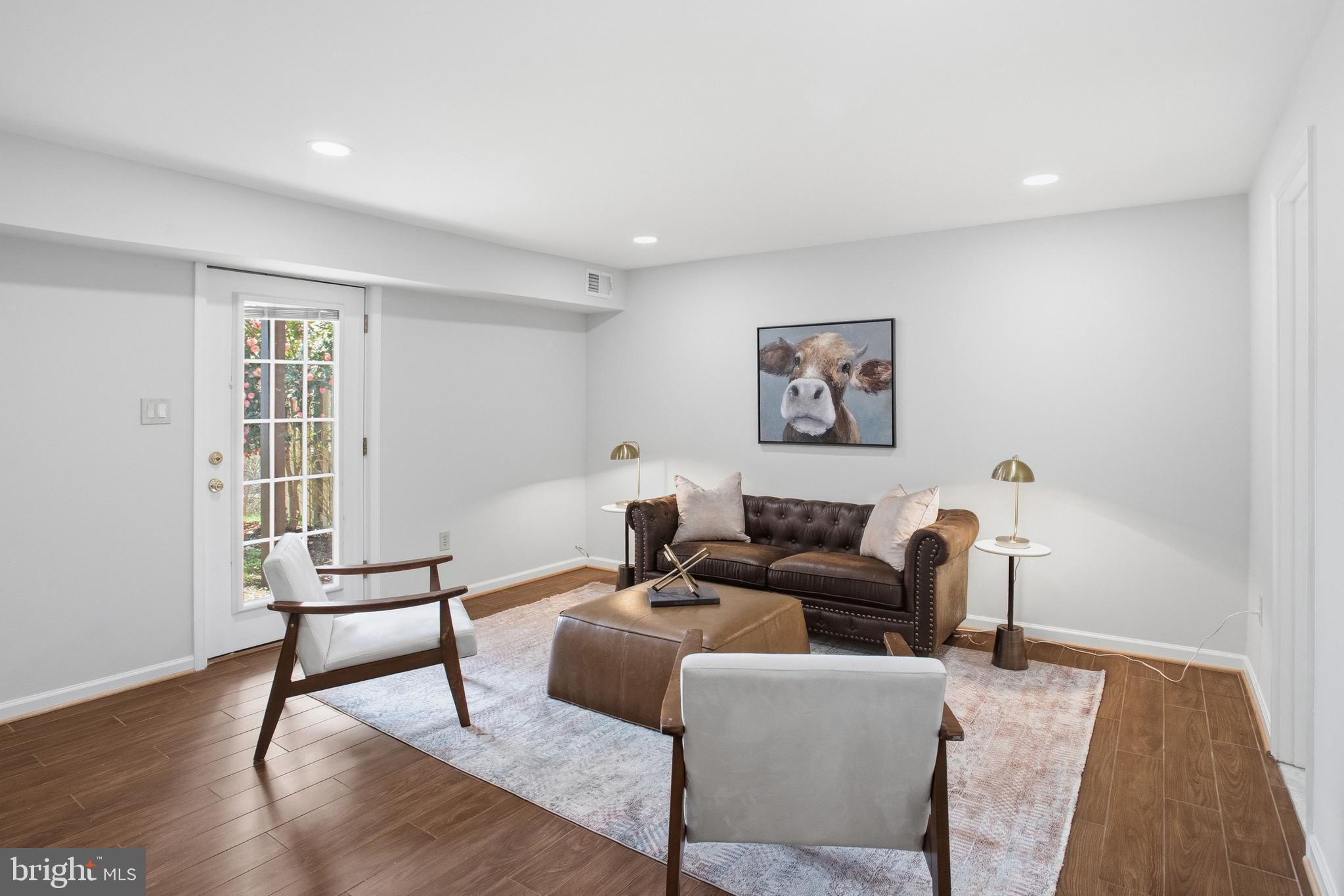 5251 Spring Branch Boulevard Dumfries, VA 22025 - Photo 19 of 25 a living room with furniture and a window
