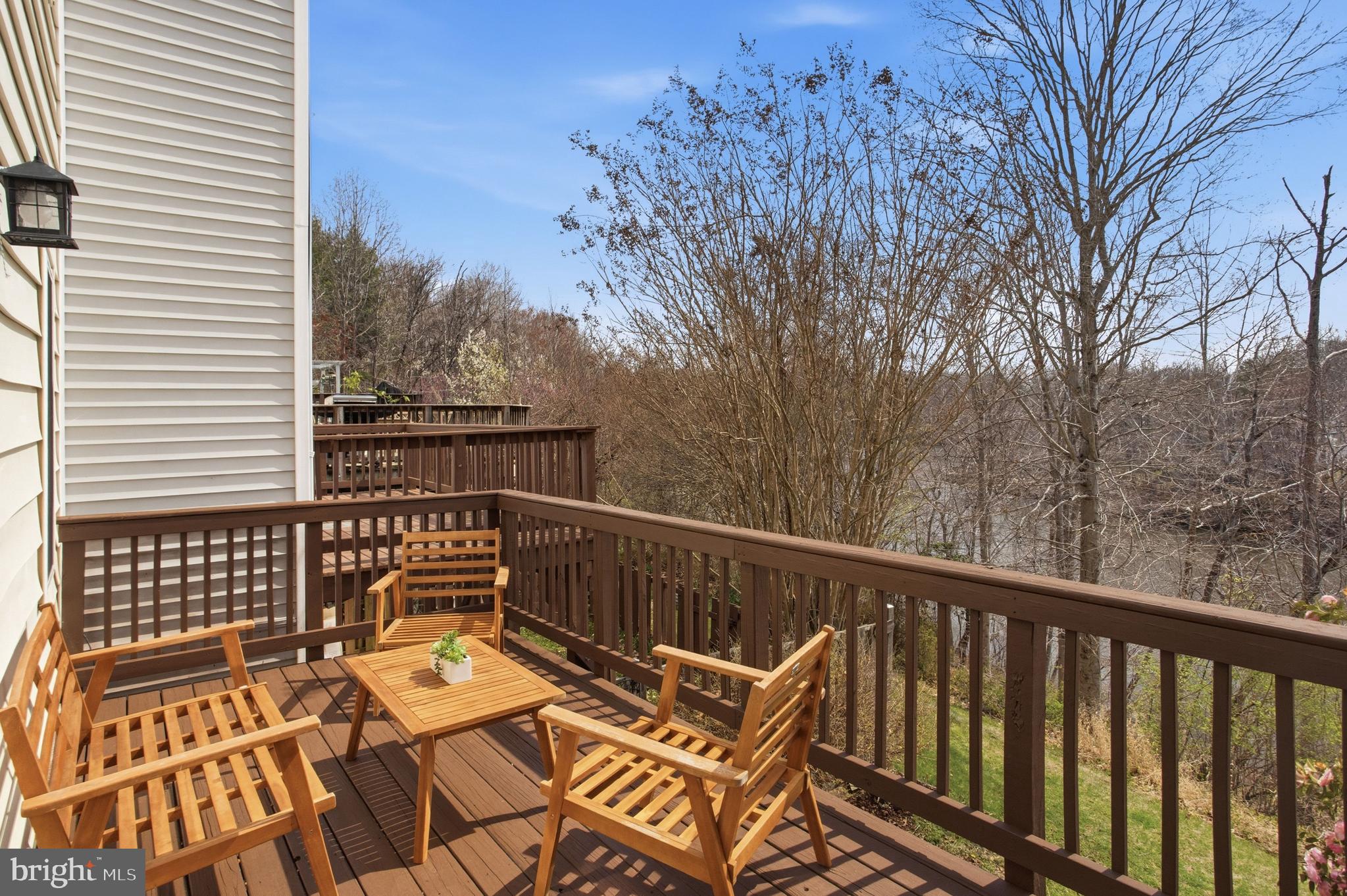 5251 Spring Branch Boulevard Dumfries, VA 22025 - Photo 23 of 25 a view of balcony with wooden floor and fence