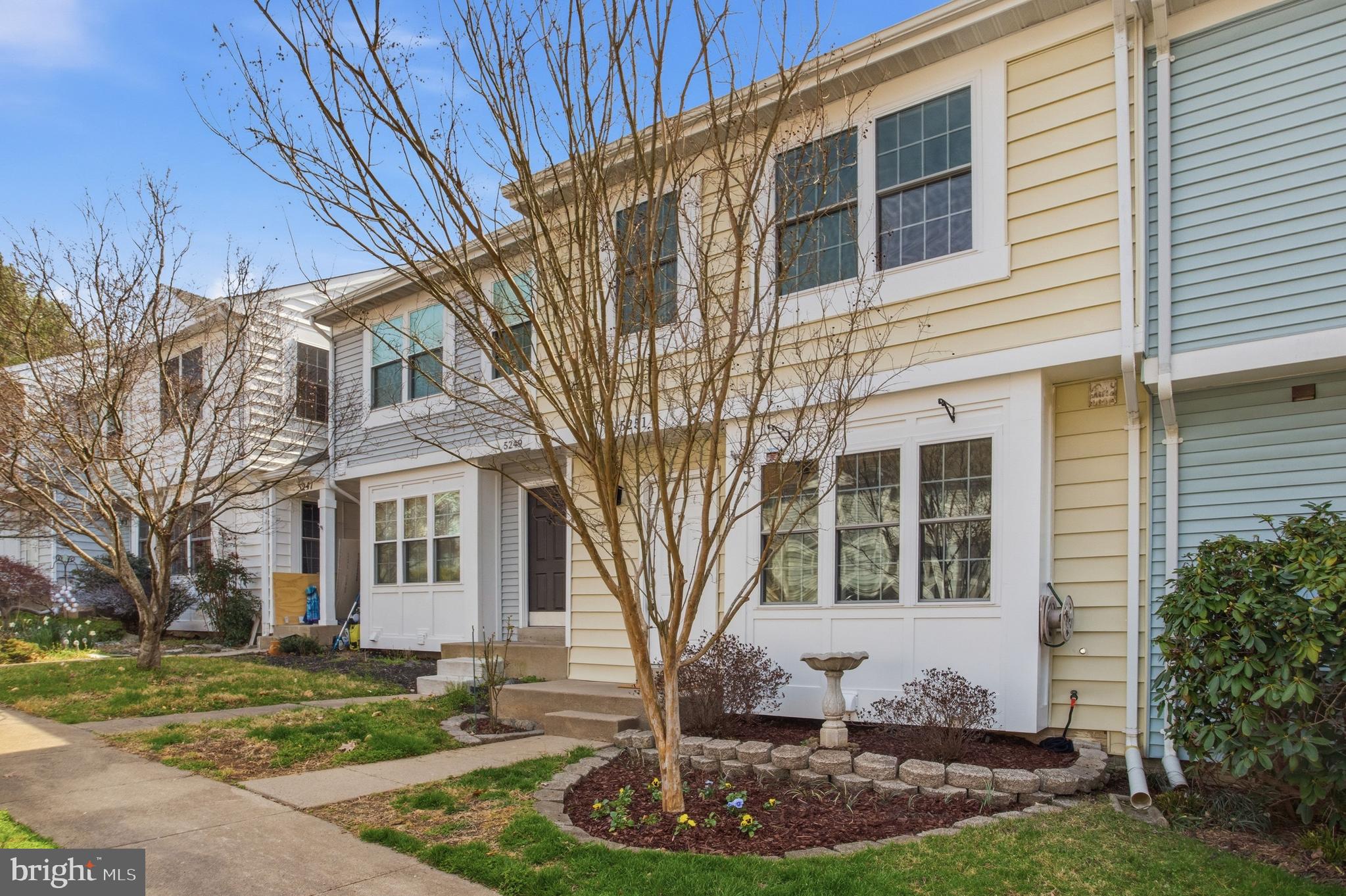 5251 Spring Branch Boulevard Dumfries, VA 22025 - Photo 25 of 25 a front view of a house with a yard