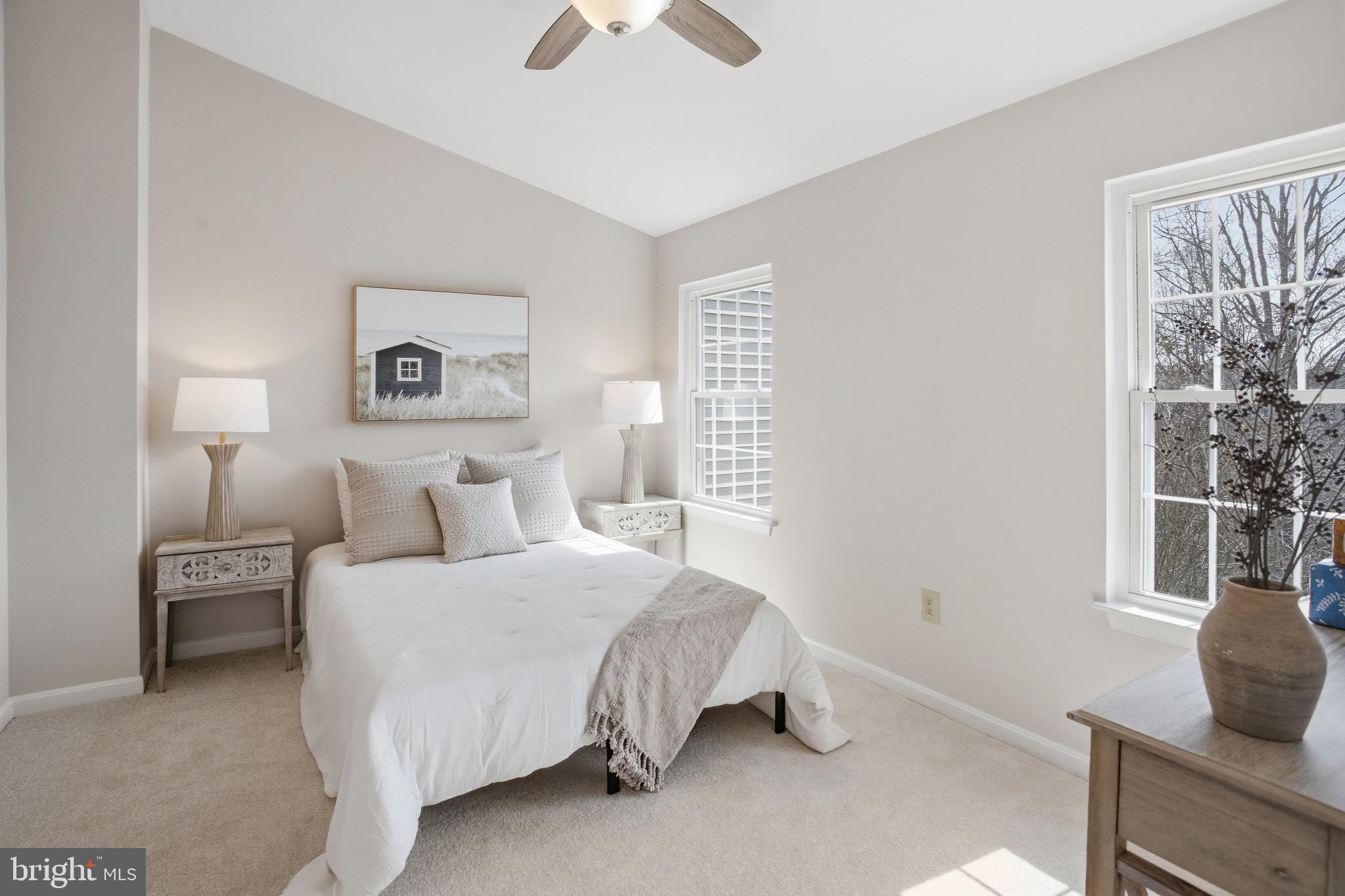 5251 Spring Branch Boulevard Dumfries, VA 22025 - Photo 8 of 25 a bedroom with a bed and a window