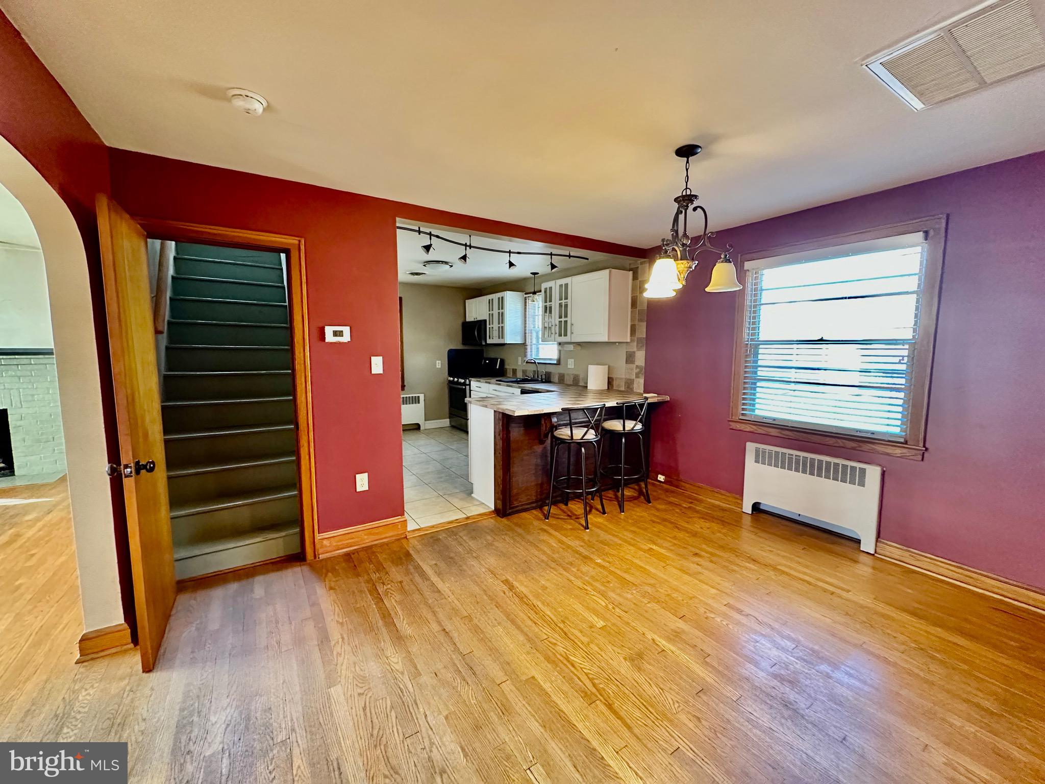 939 View Street Hagerstown, MD 21742 - Photo 11 of 24 a view of a livingroom with a furniture wooden floor and window