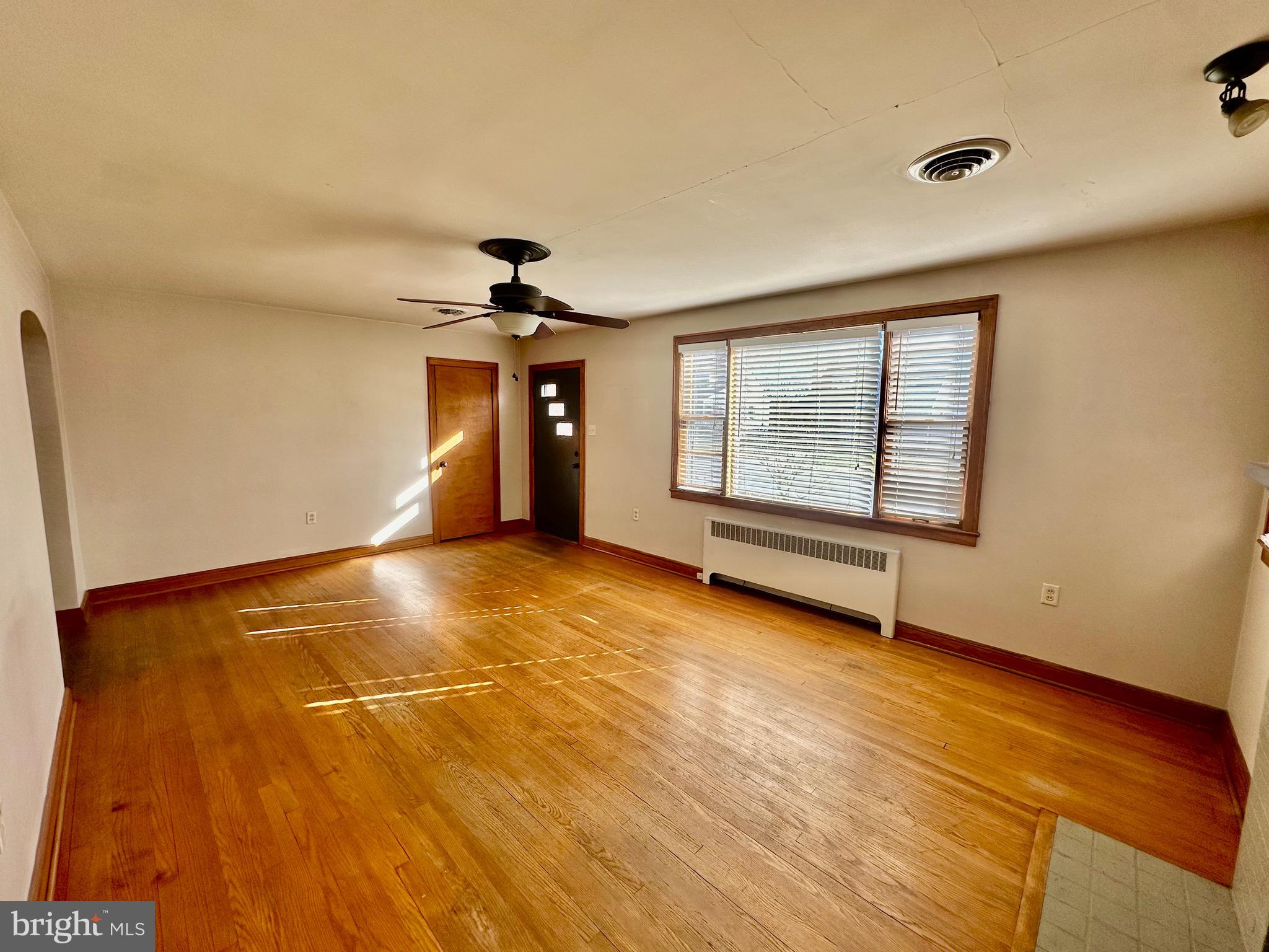 939 View Street Hagerstown, MD 21742 - Photo 6 of 24 an empty room with windows