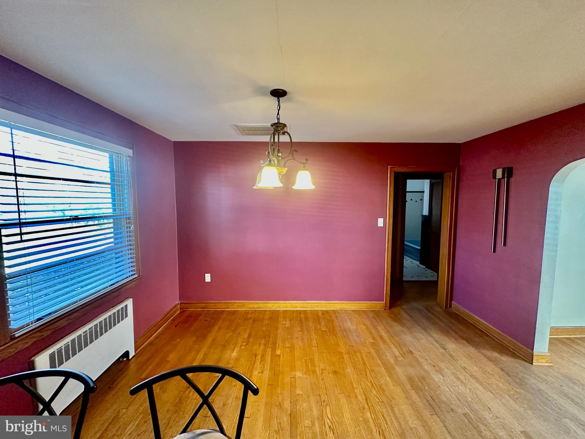939 View Street Hagerstown, MD 21742 - Photo 9 of 24 a view of a livingroom with furniture staircase and a ceiling fan