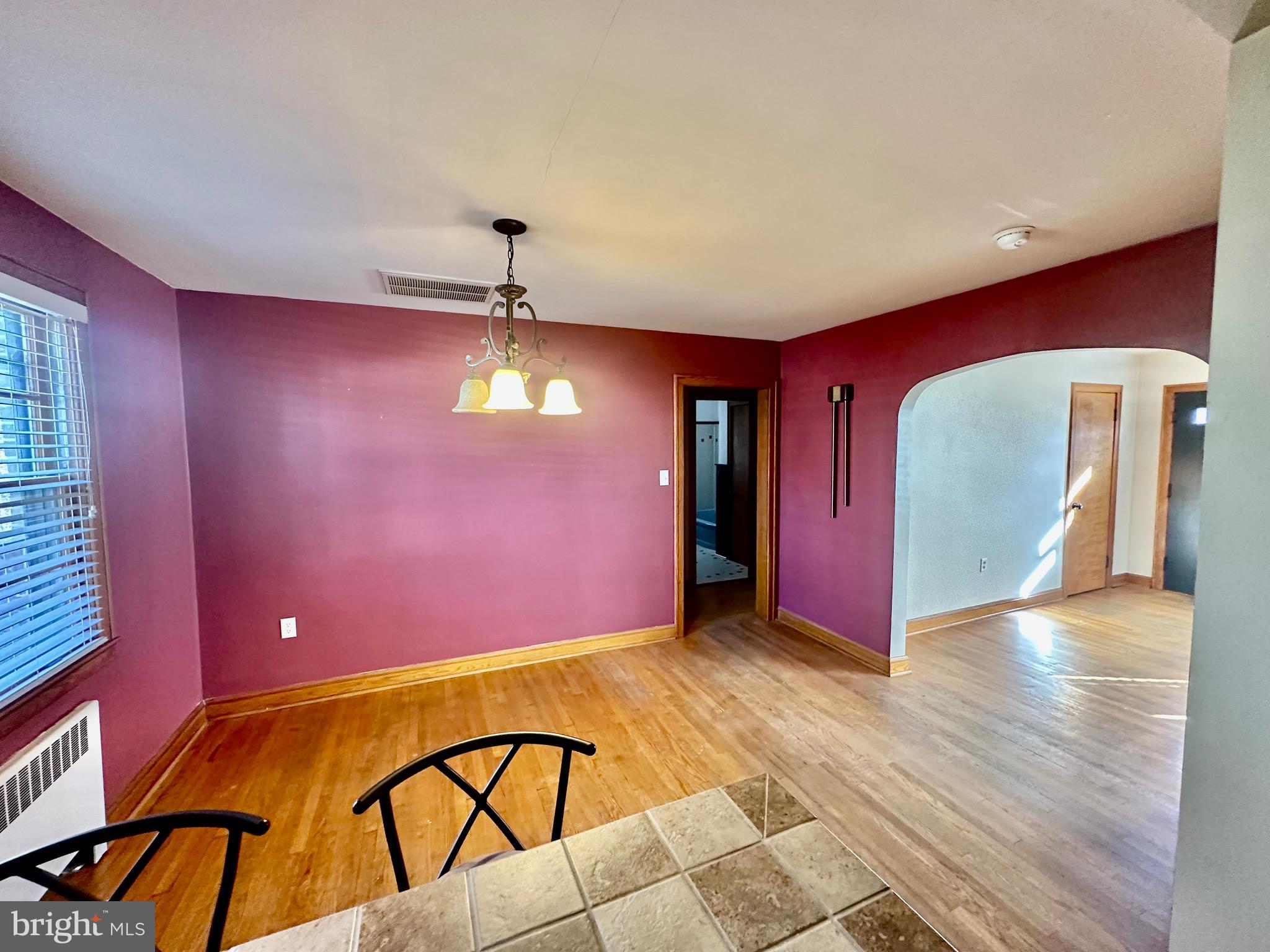 939 View Street Hagerstown, MD 21742 - Photo 10 of 24 a view of an empty room with a chandelier fan