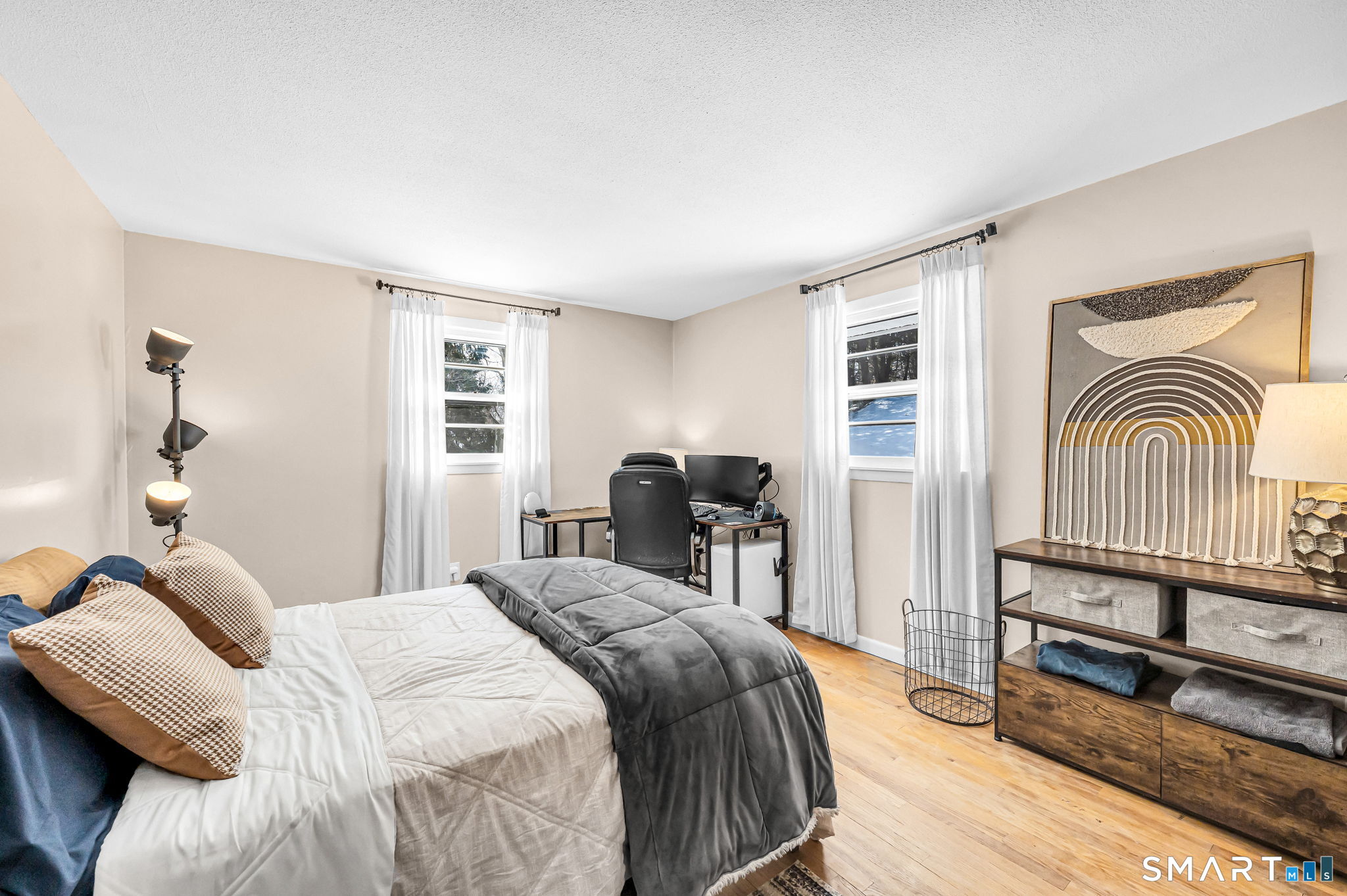 9 Hale Road Enfield, CT 06082 - Photo 16 of 40 a bedroom with a bed and a large mirror on the dresser