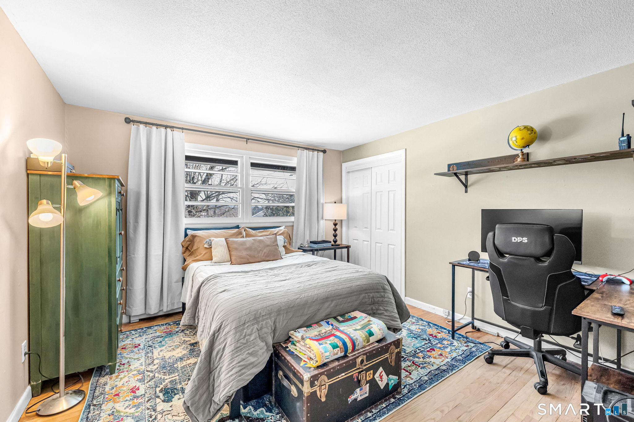 9 Hale Road Enfield, CT 06082 - Photo 18 of 40 a bed sitting in a bedroom next to a window