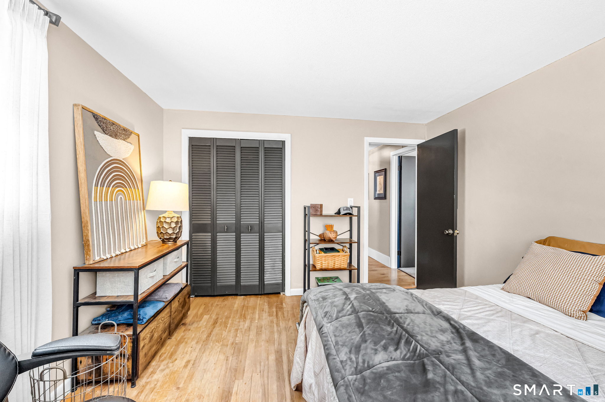 9 Hale Road Enfield, CT 06082 - Photo 19 of 40 a bedroom with a bed and a dresser