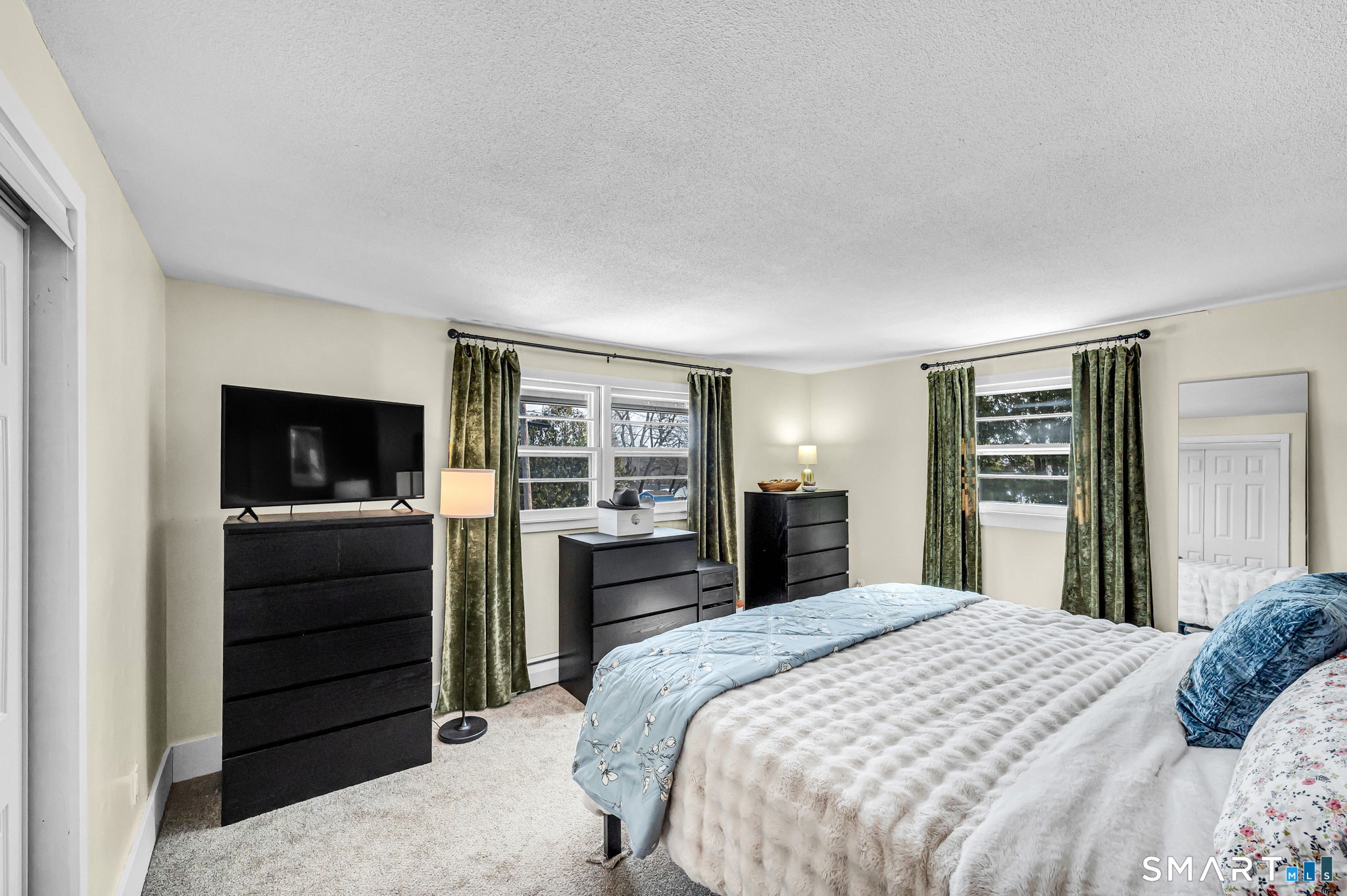 9 Hale Road Enfield, CT 06082 - Photo 20 of 40 a bedroom with a bed and a television