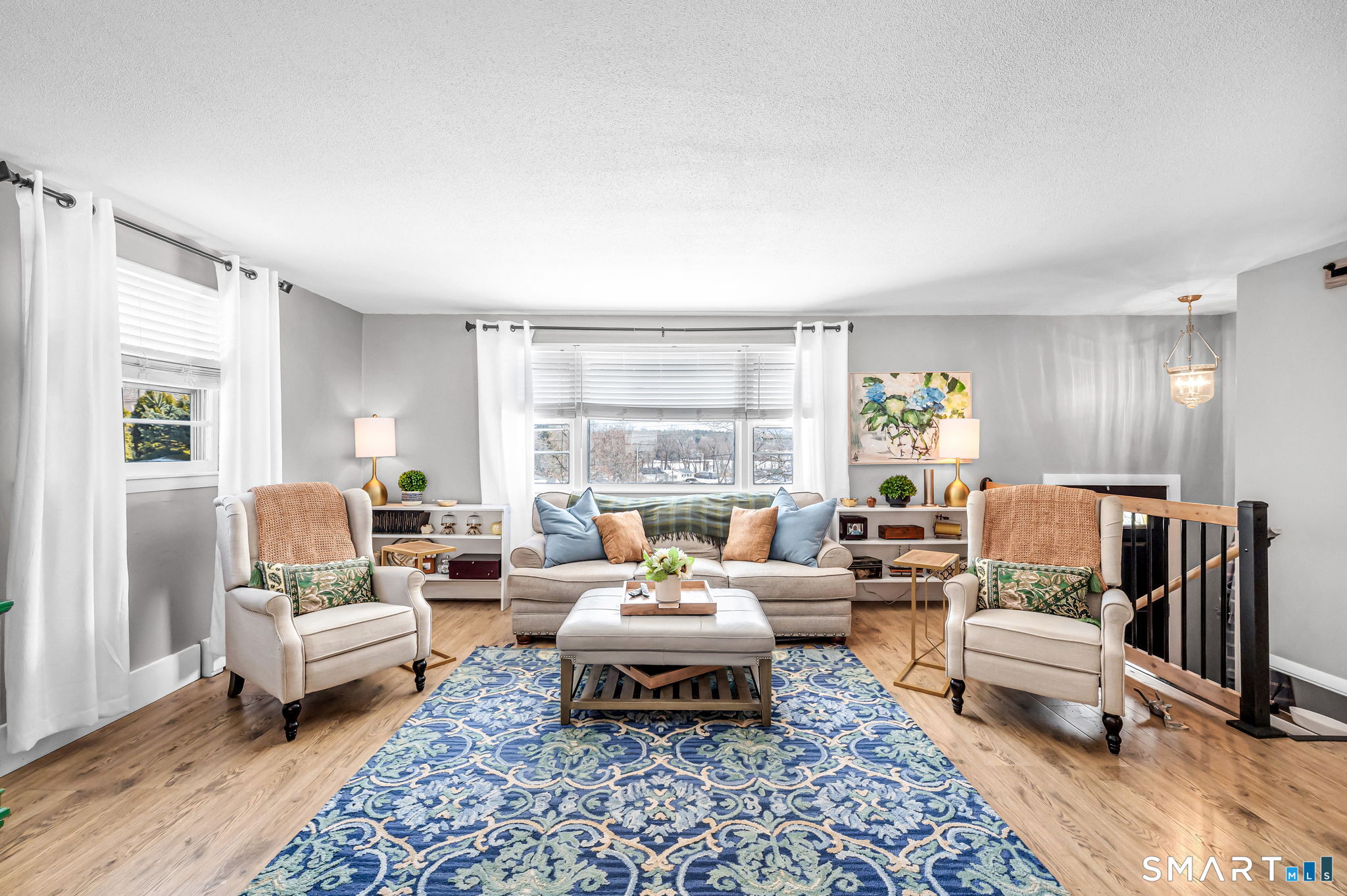 9 Hale Road Enfield, CT 06082 - Photo 2 of 40 a living room with furniture and a rug