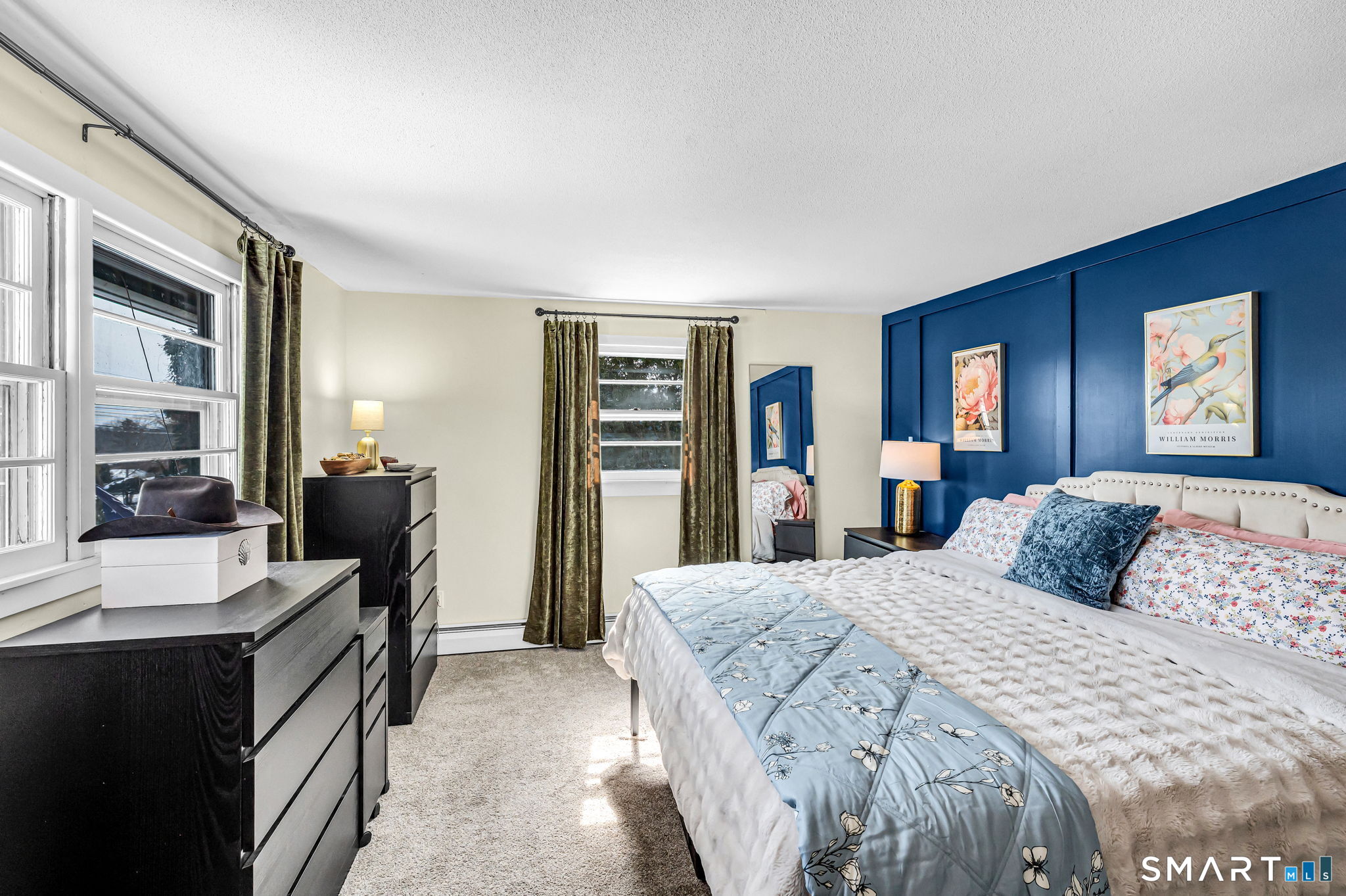 9 Hale Road Enfield, CT 06082 - Photo 21 of 40 a bedroom with a large bed and a dresser