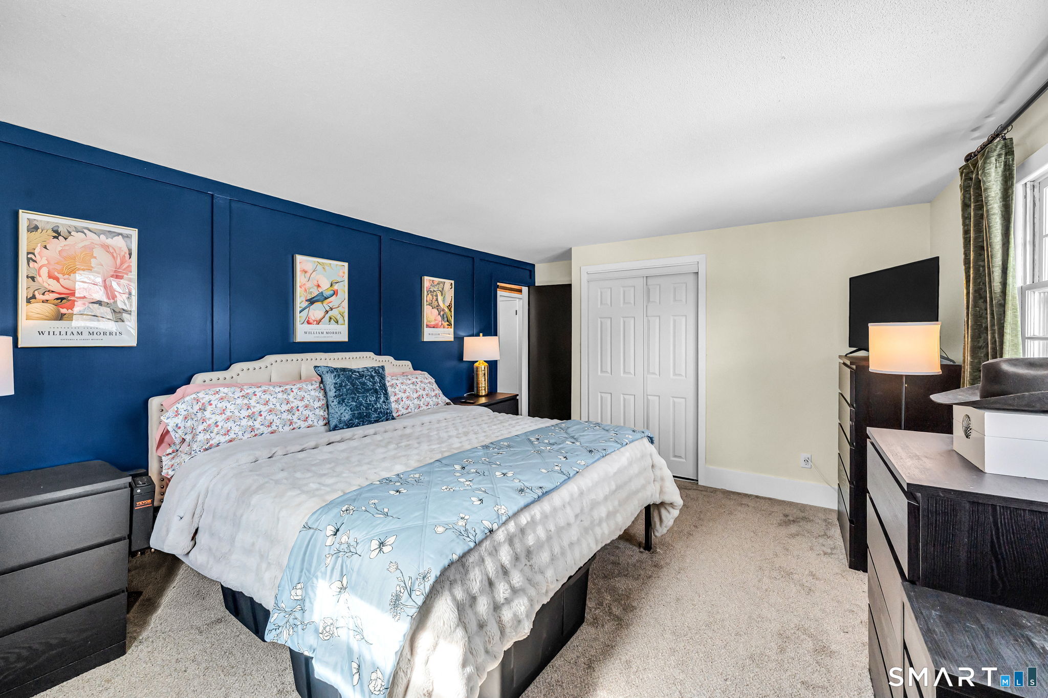 9 Hale Road Enfield, CT 06082 - Photo 22 of 40 a spacious bedroom with a bed and a dresser