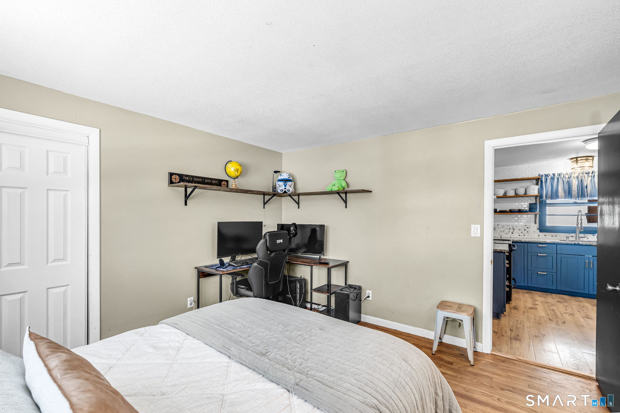 9 Hale Road Enfield, CT 06082 - Photo 23 of 40 a bedroom with a bed and furniture