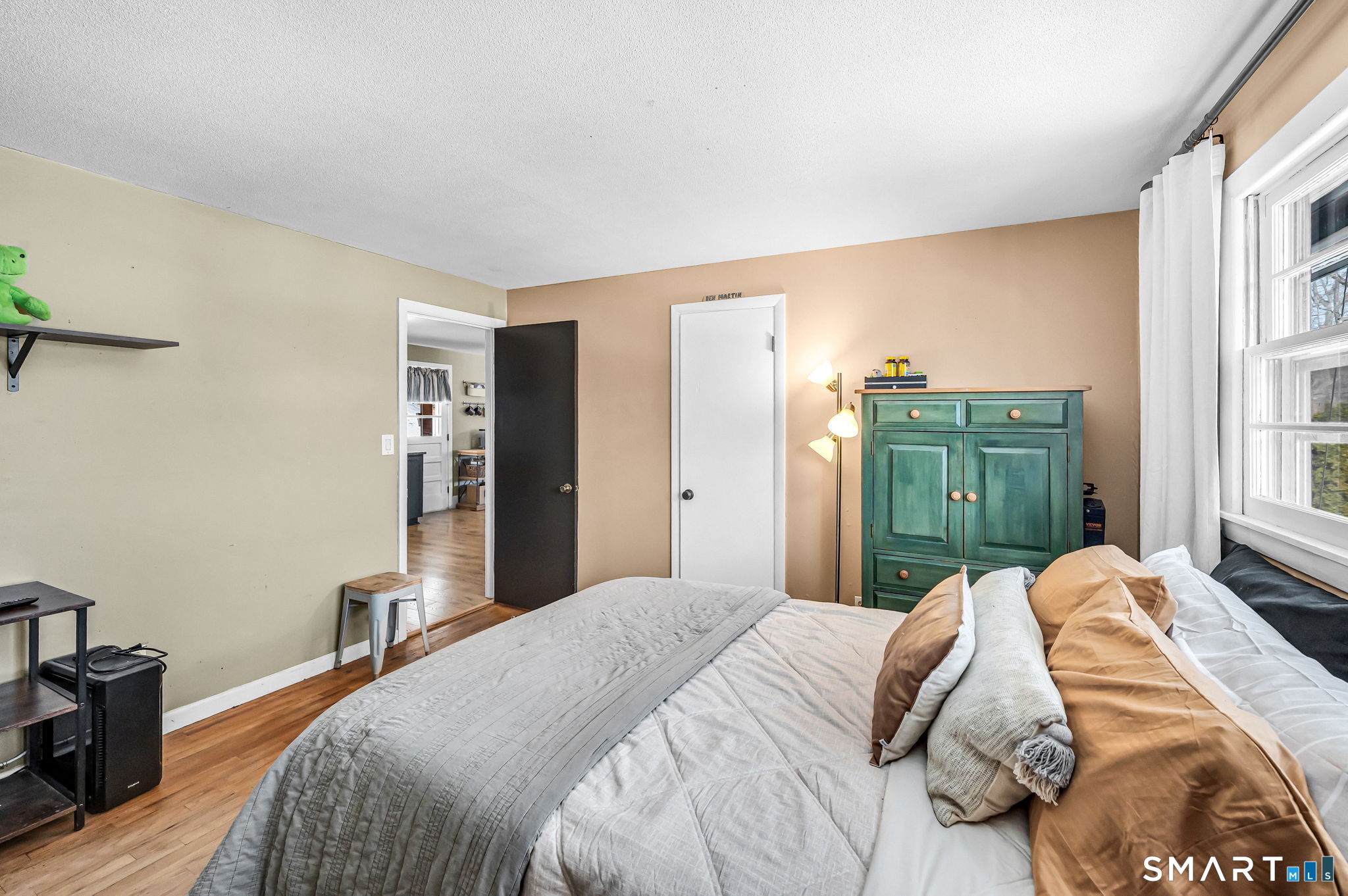 9 Hale Road Enfield, CT 06082 - Photo 24 of 40 a bedroom with a bed and a window