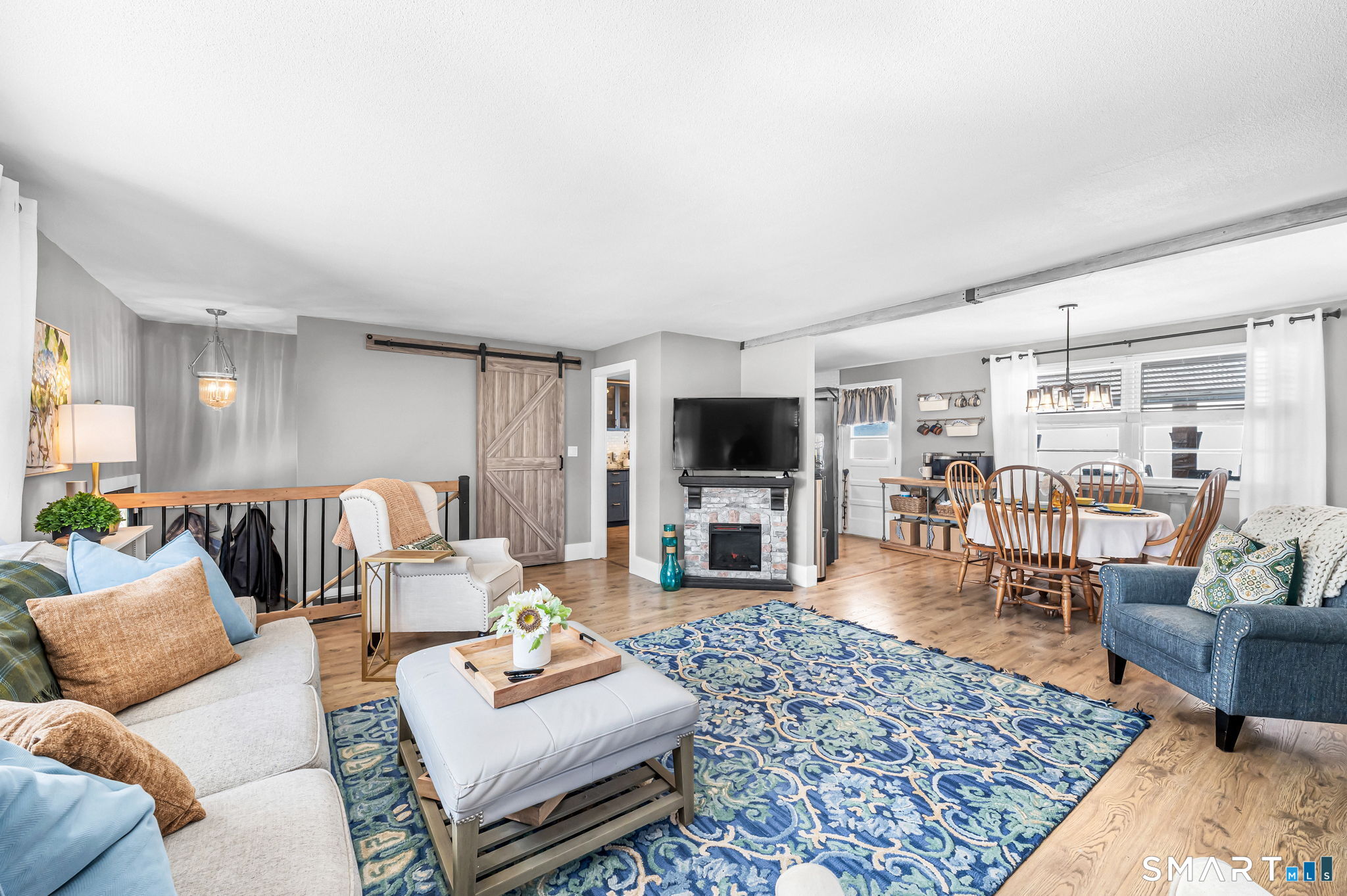 9 Hale Road Enfield, CT 06082 - Photo 4 of 40 a living room with furniture and a flat screen tv