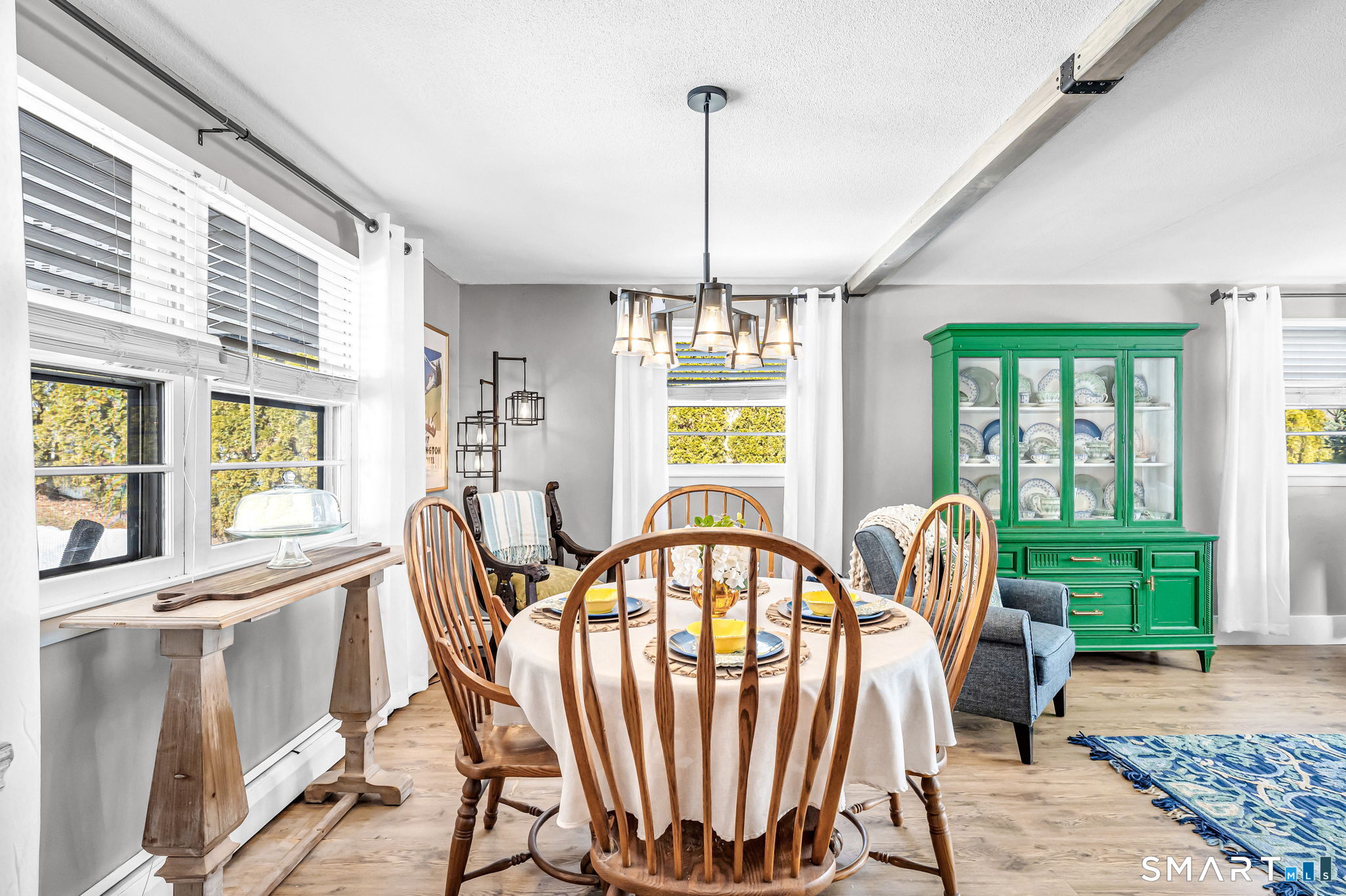 9 Hale Road Enfield, CT 06082 - Photo 10 of 40 a view of a dining room with furniture window and wooden floor