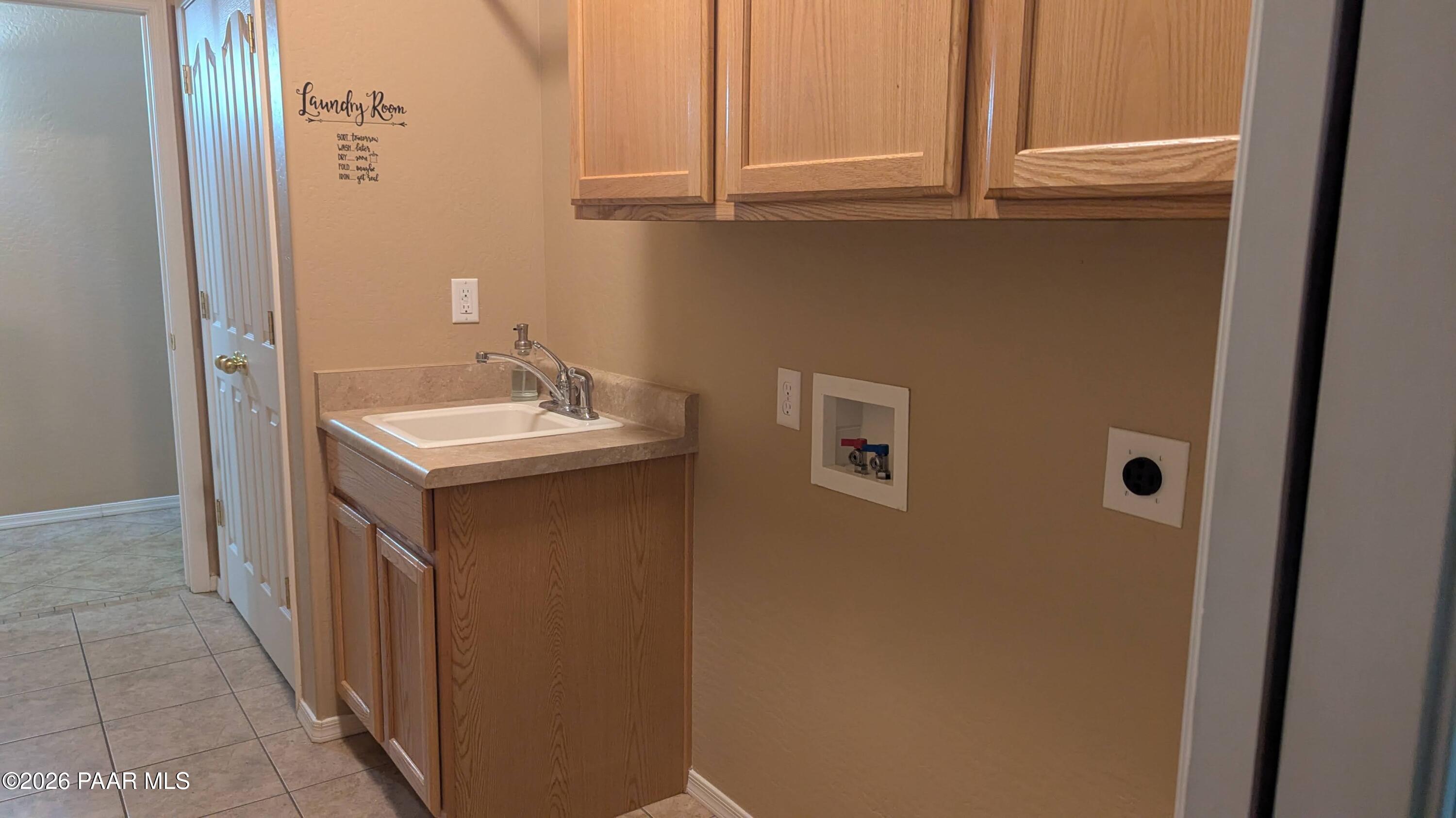 3416 North Victor Road, Unit 1 Prescott Valley, AZ 86314 - Photo 15 of 27 a bathroom with a sink and a mirror