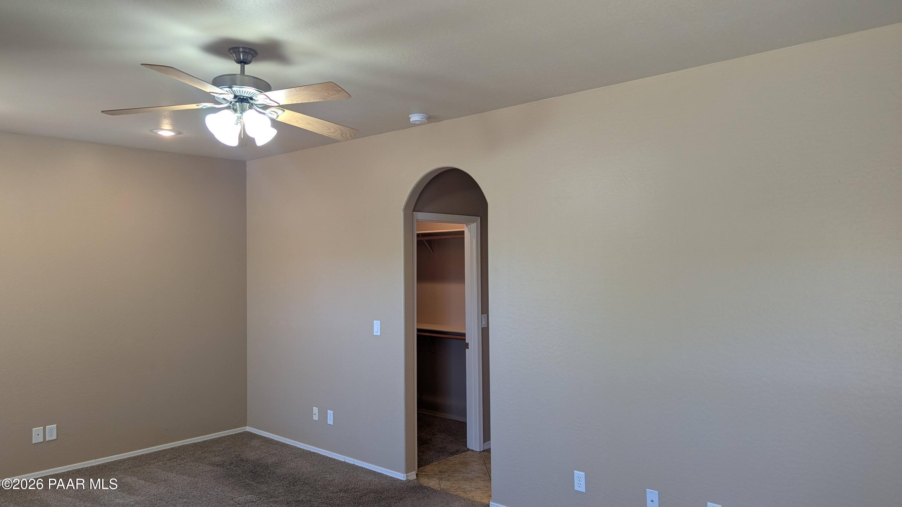 3416 North Victor Road, Unit 1 Prescott Valley, AZ 86314 - Photo 18 of 27 a view of a livingroom with a chandelier fan