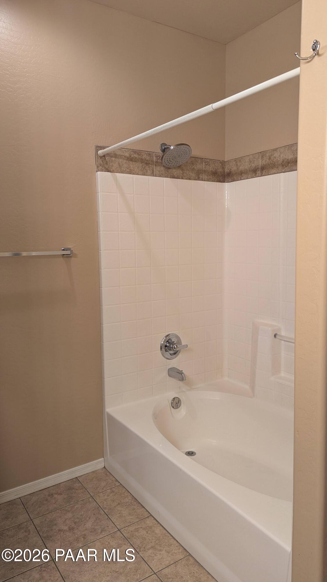 3416 North Victor Road, Unit 1 Prescott Valley, AZ 86314 - Photo 21 of 27 a bathroom with a bathtub and a shower
